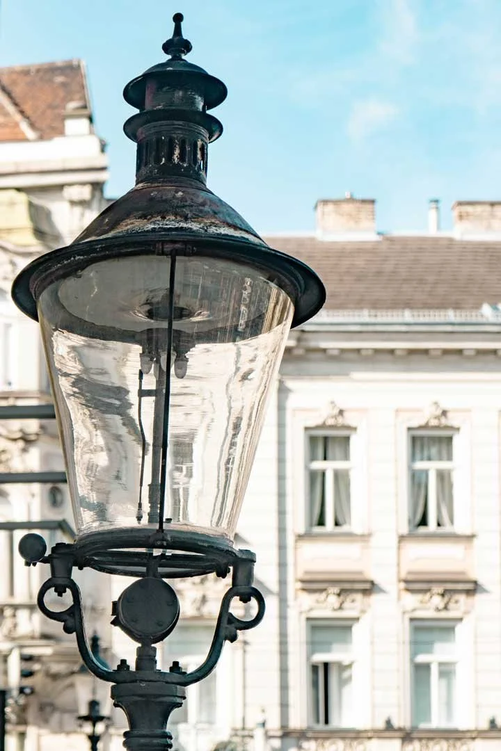 Detail of a historic street lamp in Hietzing, Vienna — the last remaining gas street lamp in Vienna