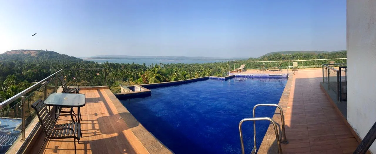Symphony by Kabella - Rooftop Infinity Pool Ocean View Apartments in Vagator
