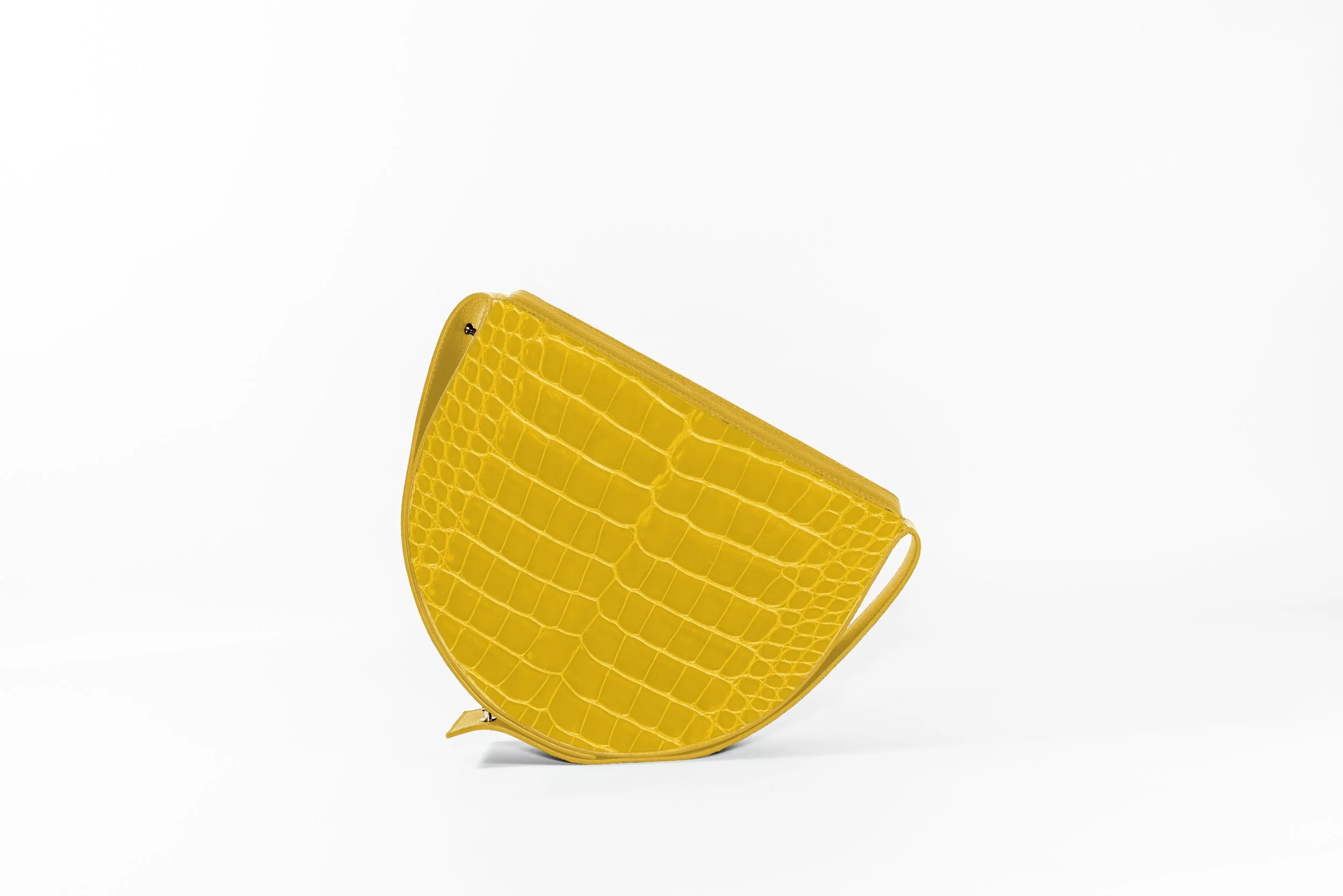 Adrian croc Yellow clutch Leonardo edit.jpg