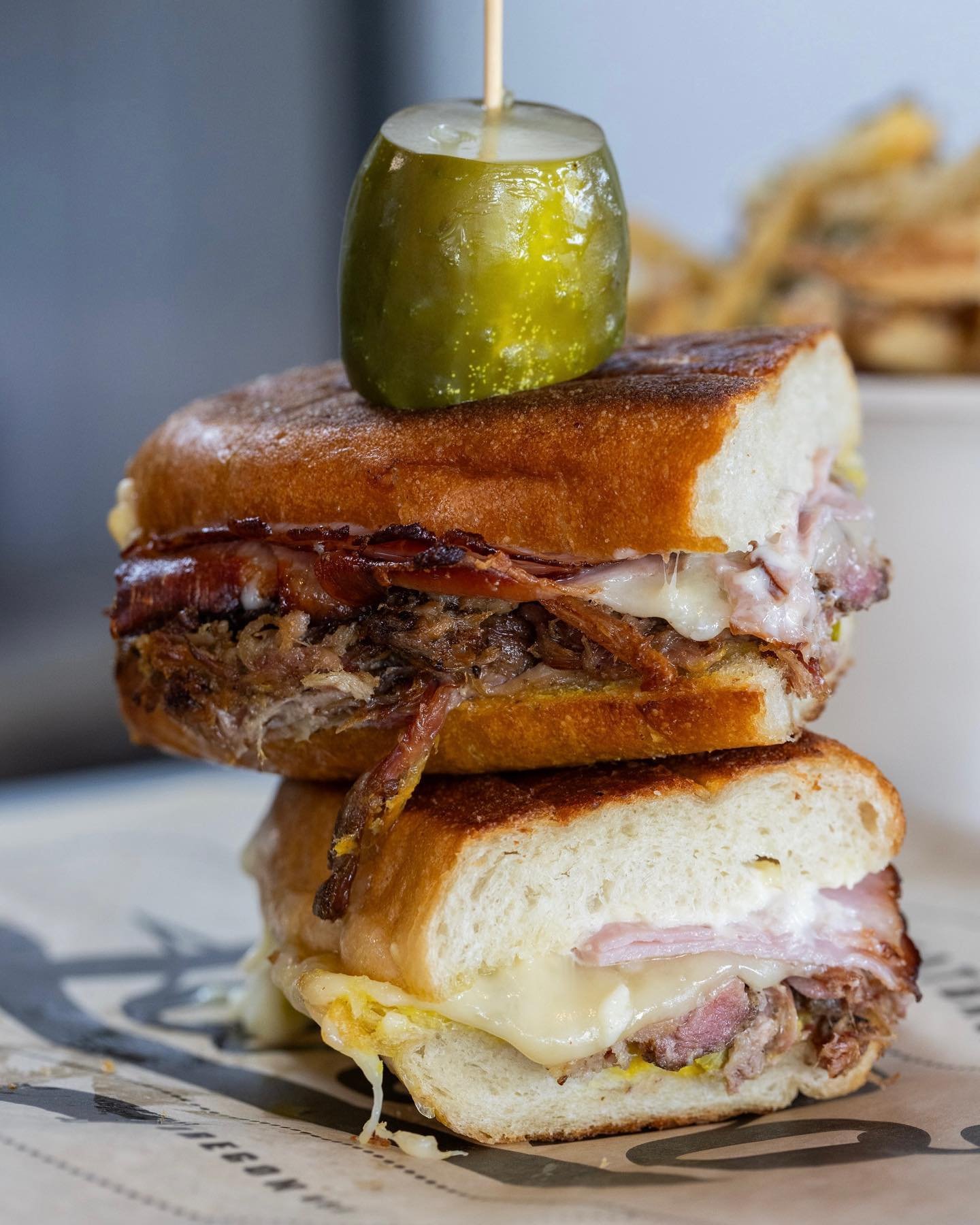 The Smokey C ages well,  for picnicking, or middle of the night snacking! Happy Saturday PDX. 

Smokey Cubano. Smoked and mojo braised pork shoulder, shaved ham, Swiss cheese, sweet pickles, yellow mustard and mayo, Dos Hermanos Cubano roll. 
-
📸@al