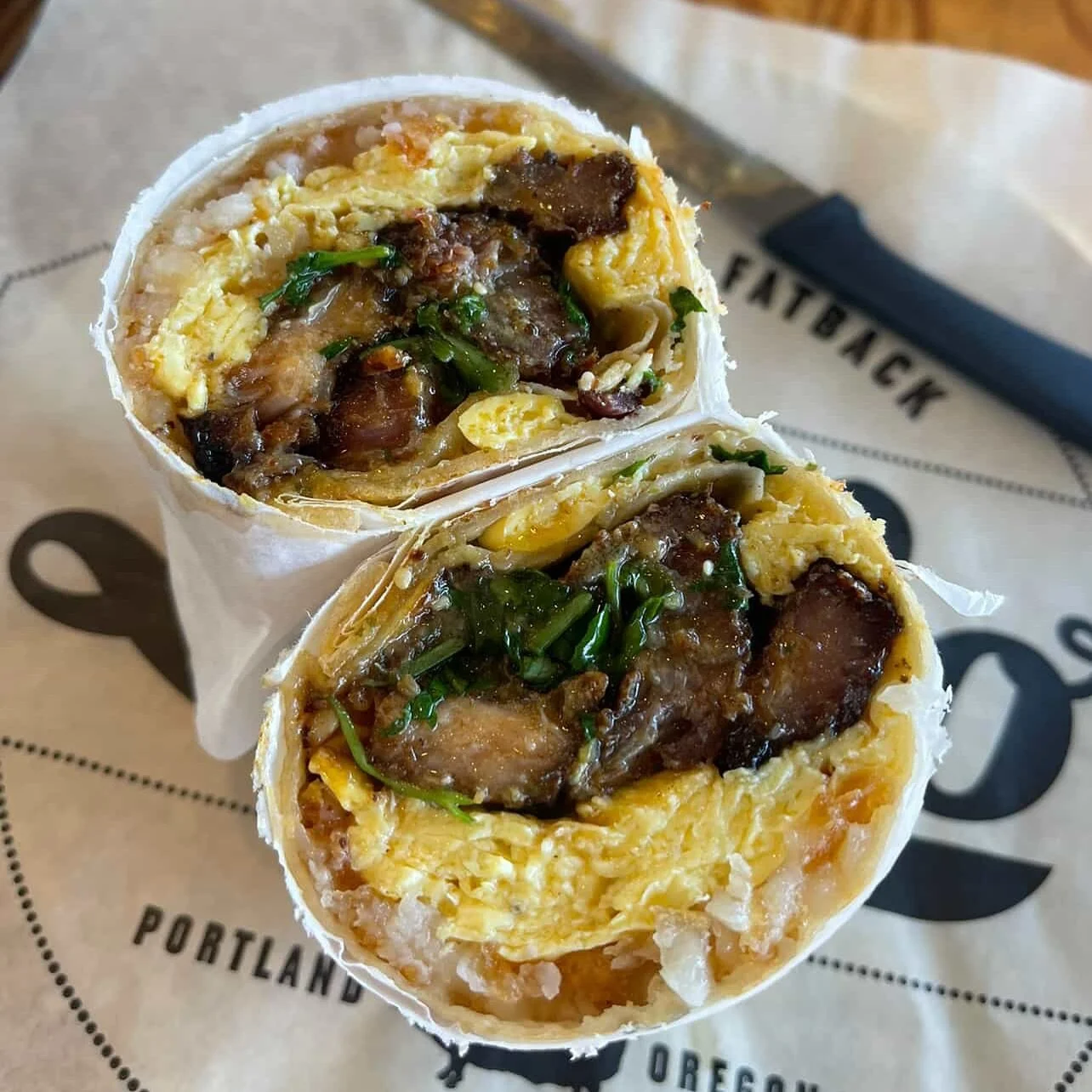 This breakfast burrito is what mornings are made for. 🌯 ✨ Have you tried our Rhinestone 💎 Breakfast Burrito with cheddar scramble, pork belly burnt ends, smashed tots, avocado salsa verde, and cilantro? 🌿 See you at 11am! &hearts;️ 

Photo Credit: