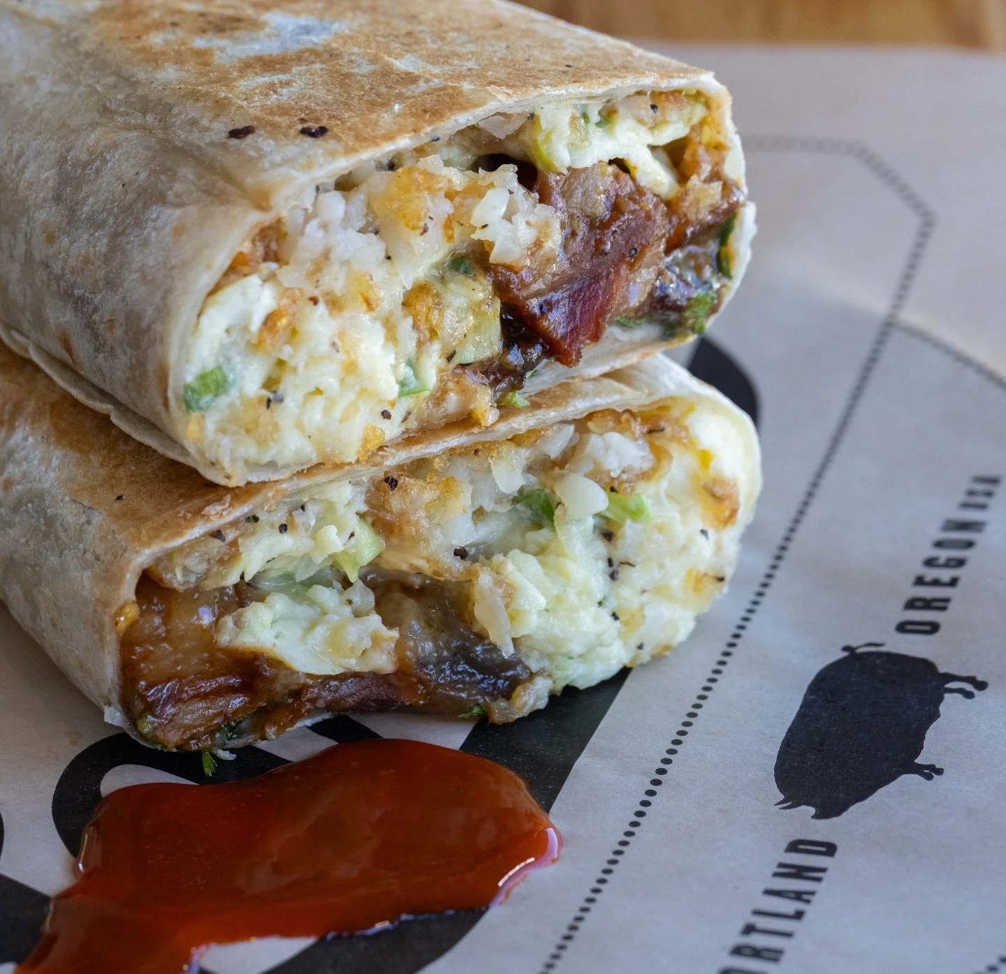 Rise and shine, it&rsquo;s burrito time! 🌯💛 This loaded breakfast burrito with pork belly burnt ends 🐷 is the kind of morning motivation we all need. Warm, hearty, and made to satisfy, it&rsquo;s calling your name when we open at 11am. Don&rsquo;t