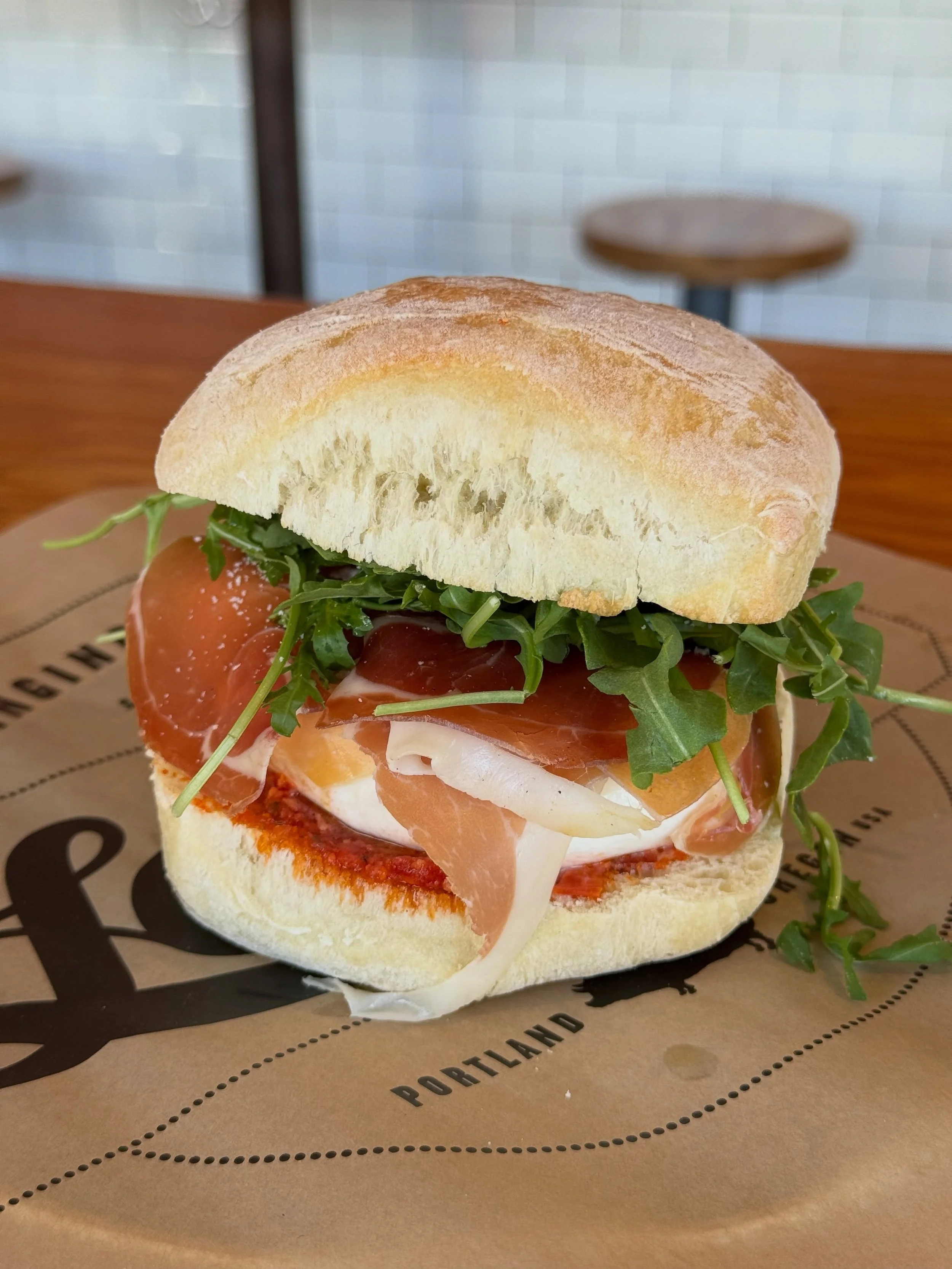 Italian Flag 🇮🇹 is here! Burrata, pomodoraccio, arugula pesto, olive oil, sea salt, definitely add the prosciutto! 🐽 ✨ We are open and here until 10pm, so run, don&rsquo;t walk for this delicious summer sammie! 🥪 🍅 
&bull;
&bull;
&bull;
Italian 