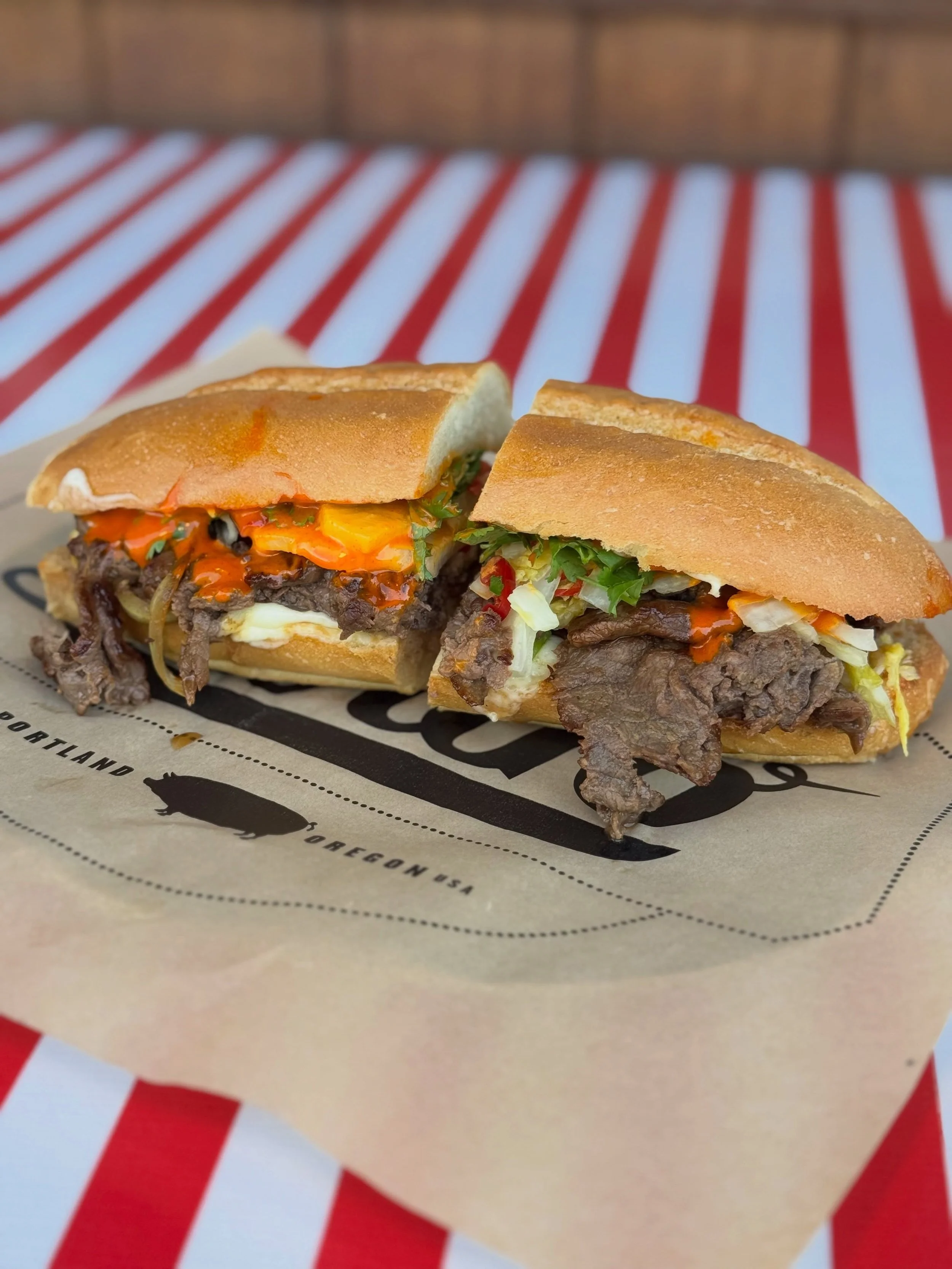 Have you tried our June Chefwich yet?! SOOS K-Town Steak Sandwich 🥩 ✨ Bulgogi marinated shaved steak, jack cheese, Gochu sauce, white kimchi, cilantro, @2_hermanos_bakery Banh Mi roll! 

A portion of the proceeds from Su&rsquo;s sandwich will go dir