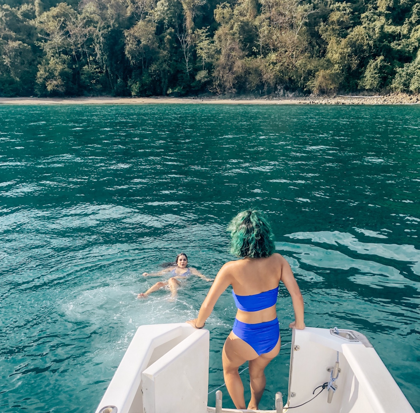 Mermaids in our lagoon - Coral Yacht Adventures.jpg
