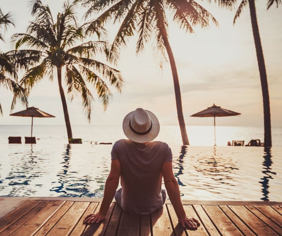 Man visualizing vacation to ground himself.