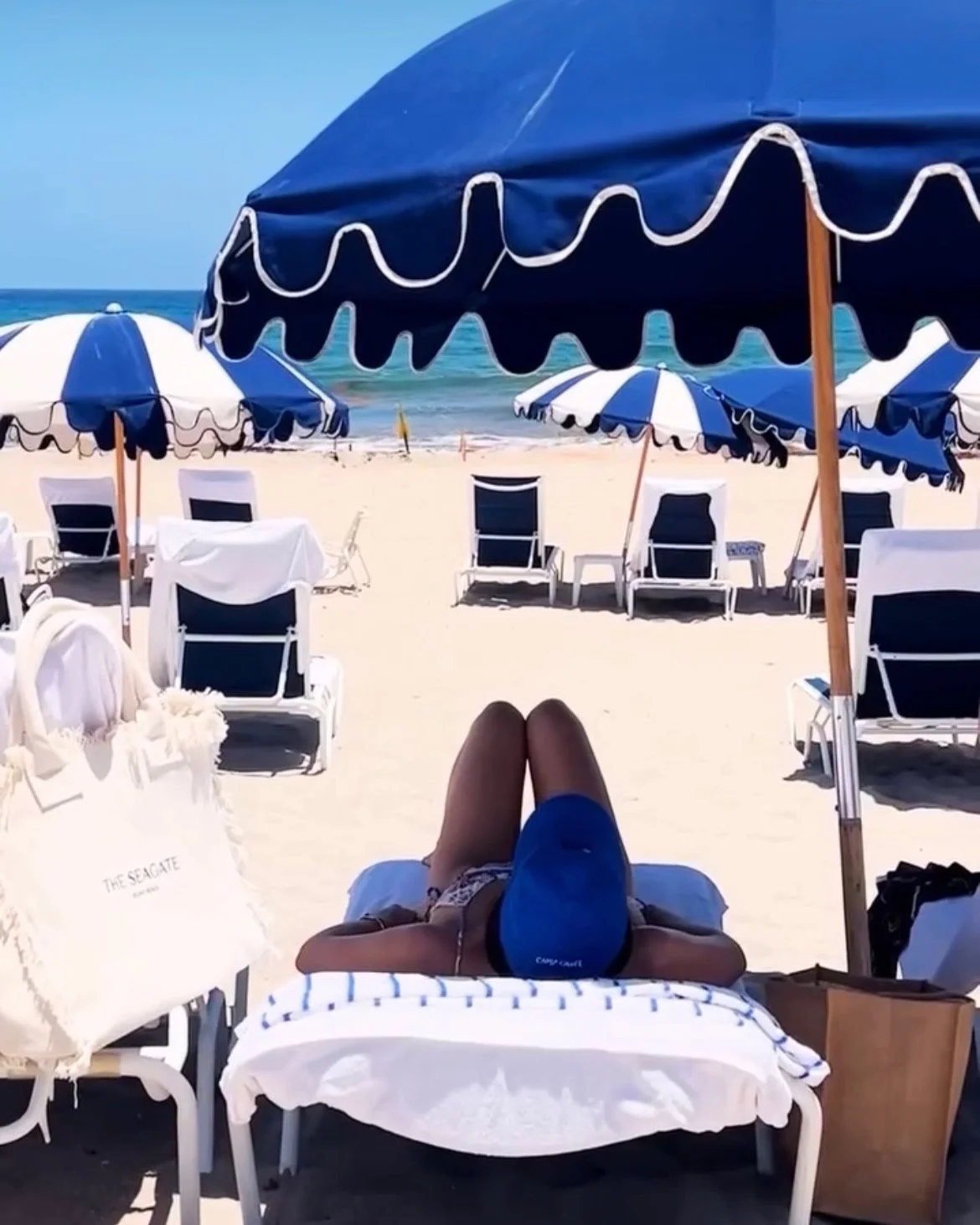 woman relaxing under umbrella - vita vie retreat.jpeg