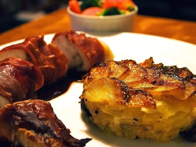 Gratin Dauphinois, Prosciutto Wrapped Monkfish. Source: Fetch 13 .