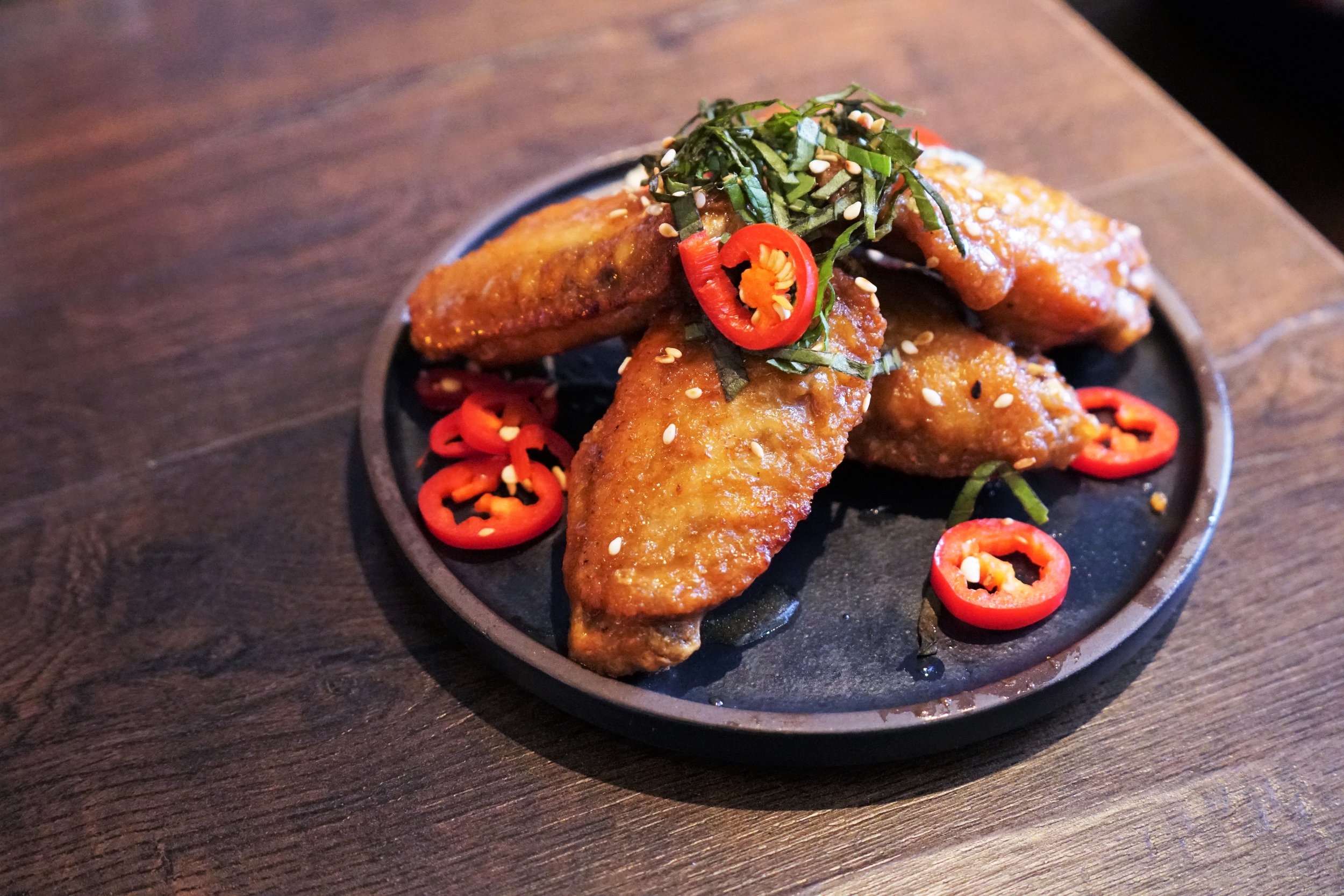 Three-Cup Glazed Chicken Wing at 886 in New York City