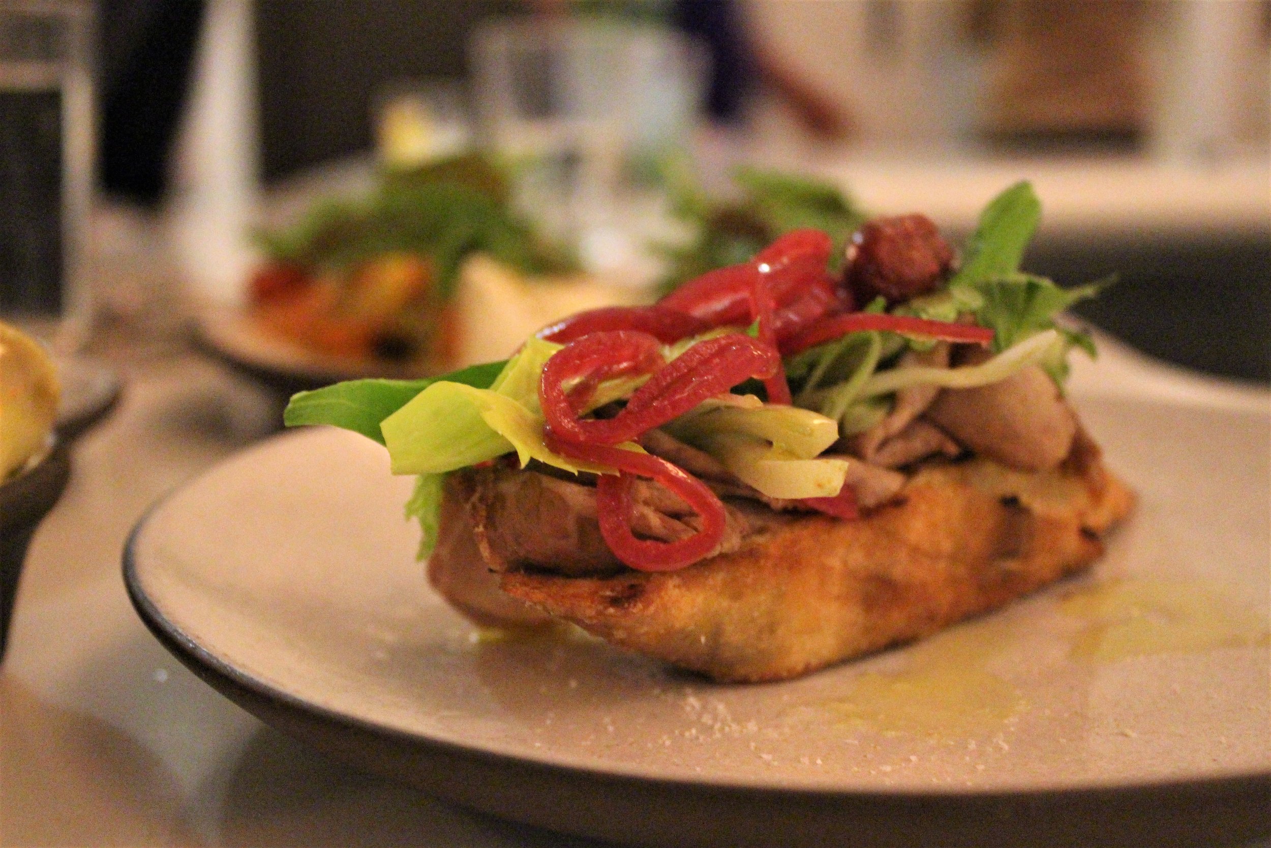 Beef Eye Round, Pickled Red Onion, Roasted Red Grapes, Celery Crostini at Sportello in Boston