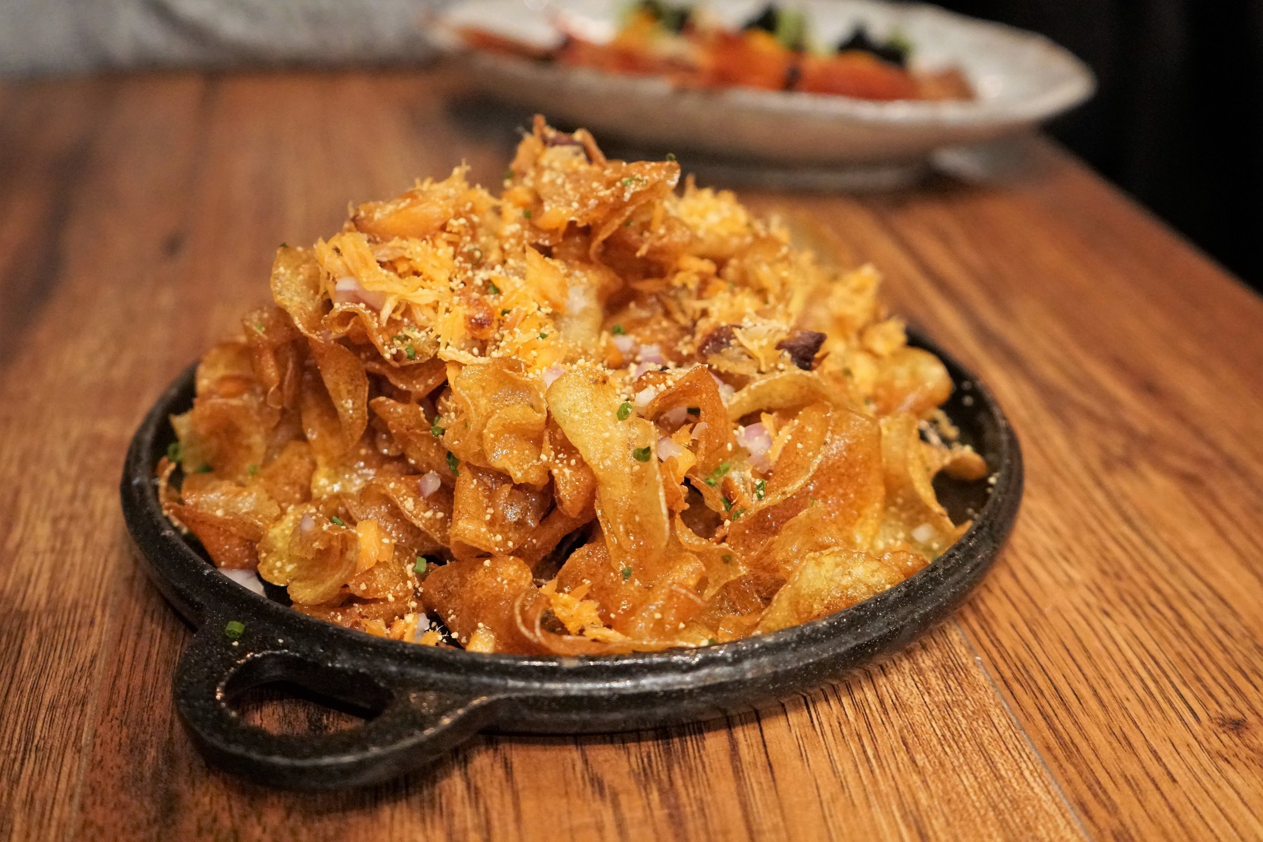 Honey Butter Chips with Scottish Salmon Jerky, Honey Butter Gastrique at Osamil in New York City