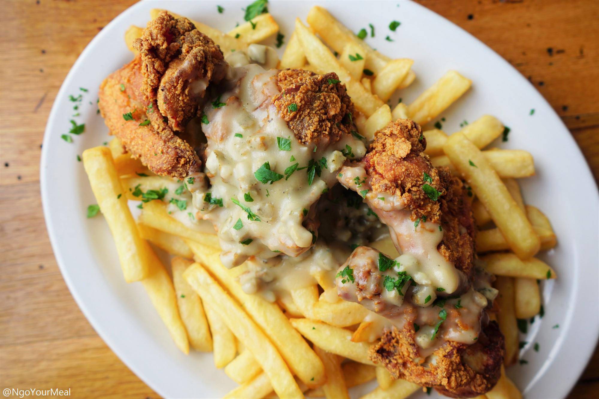 Buttermilk Fried Chicken with French Fries at Milkweed in Boston