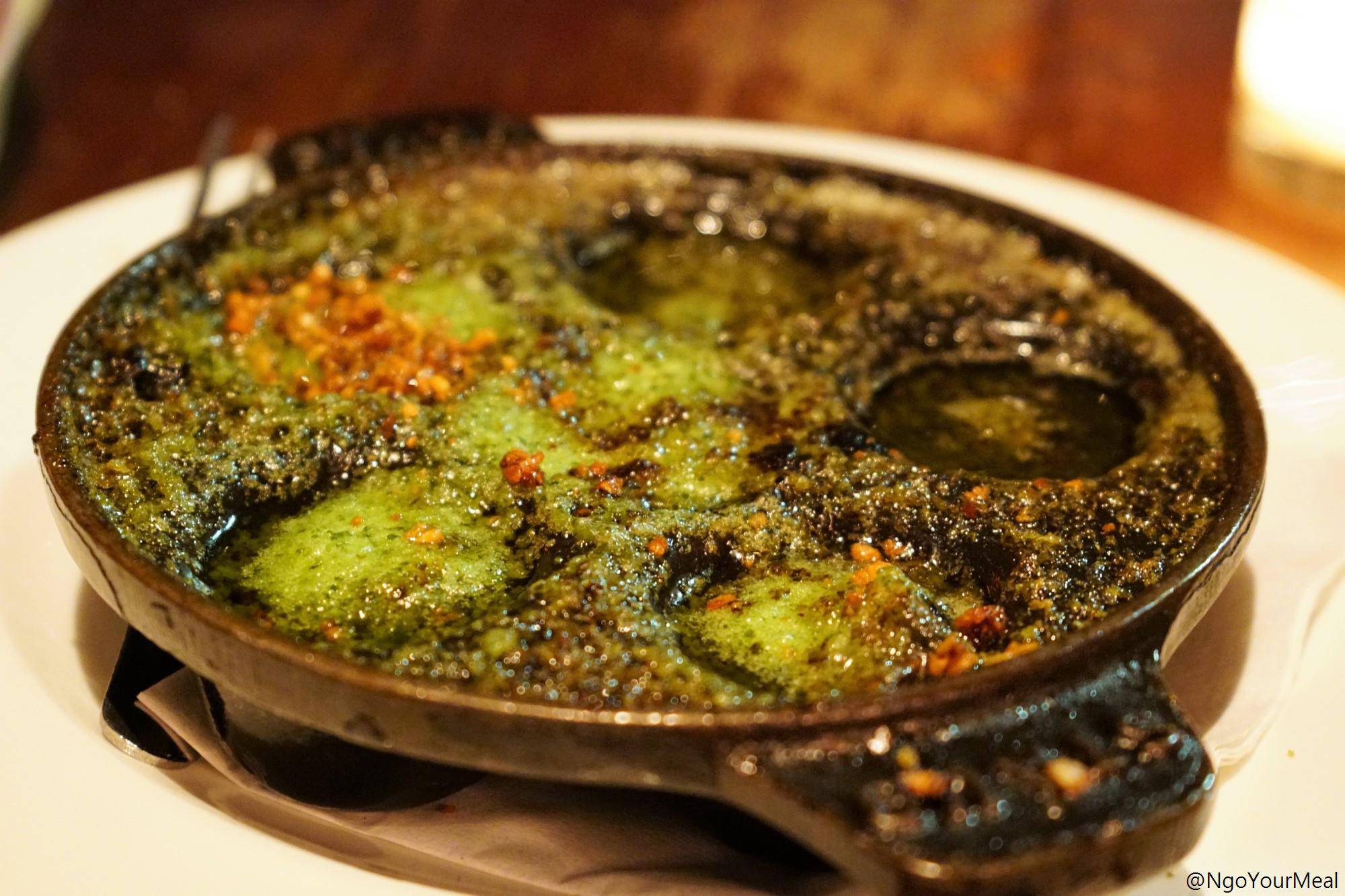 Escargots with Garlic, Parsley Butter, and Breadcrumbs at Gaslight in Boston