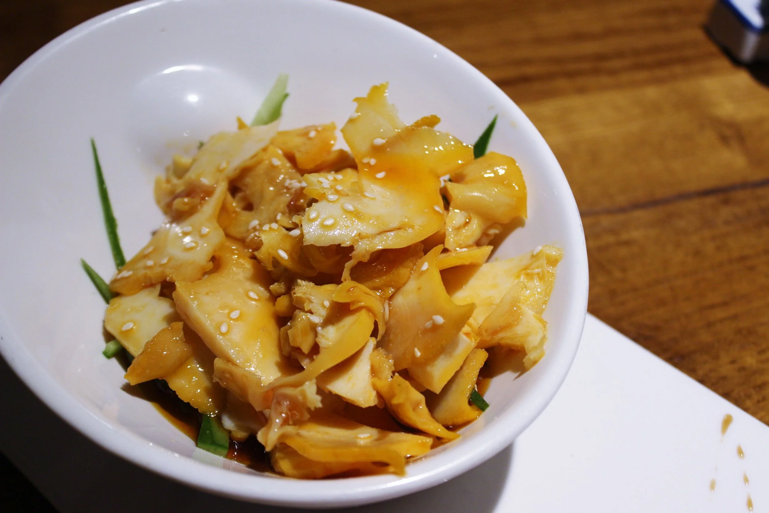 Thin Sliced Conch with Roasted Chili Vinaigrette at Szechuan Mountain House