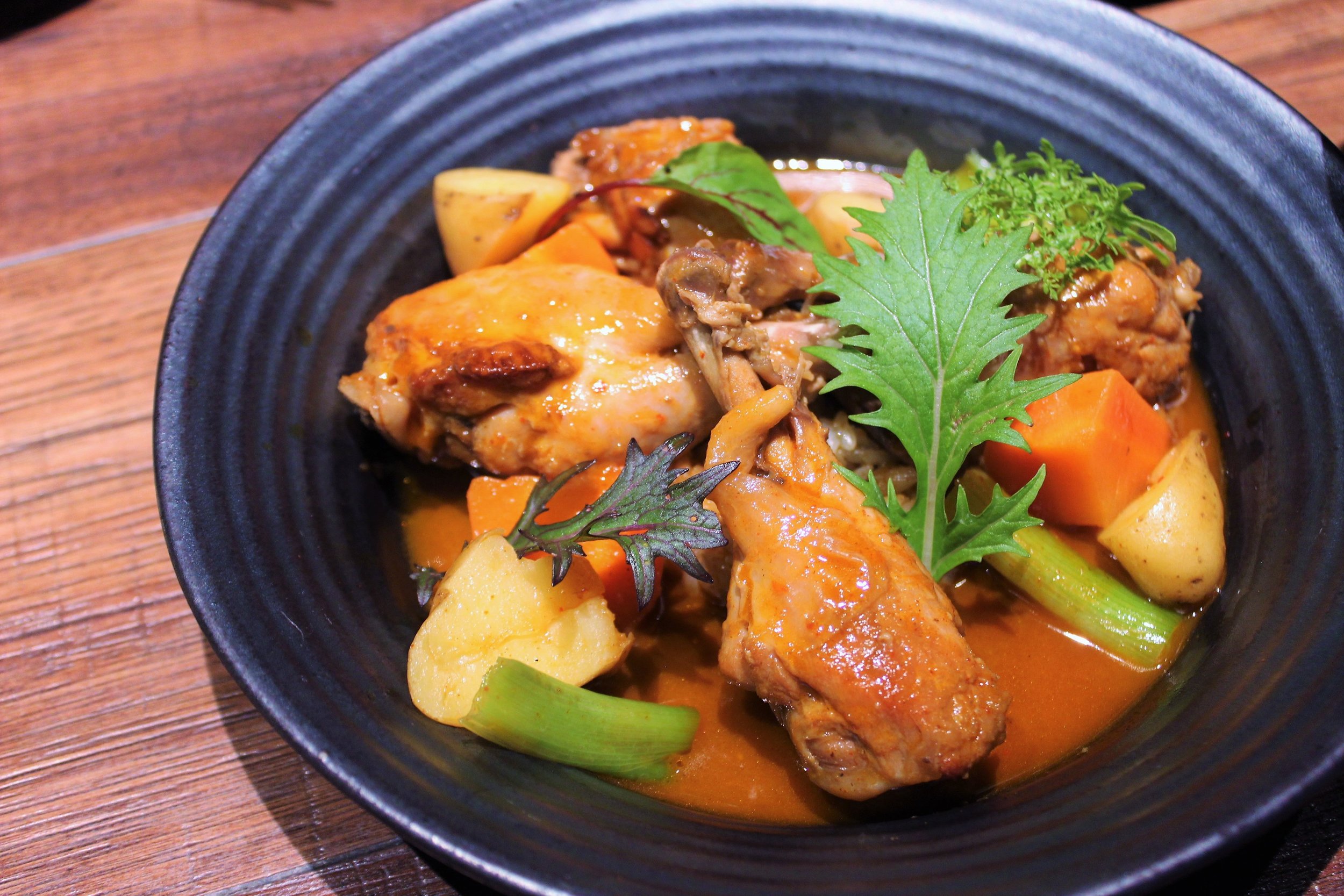 Gochujang Braised Chicken with Root Vegetables at Oiji in New York City