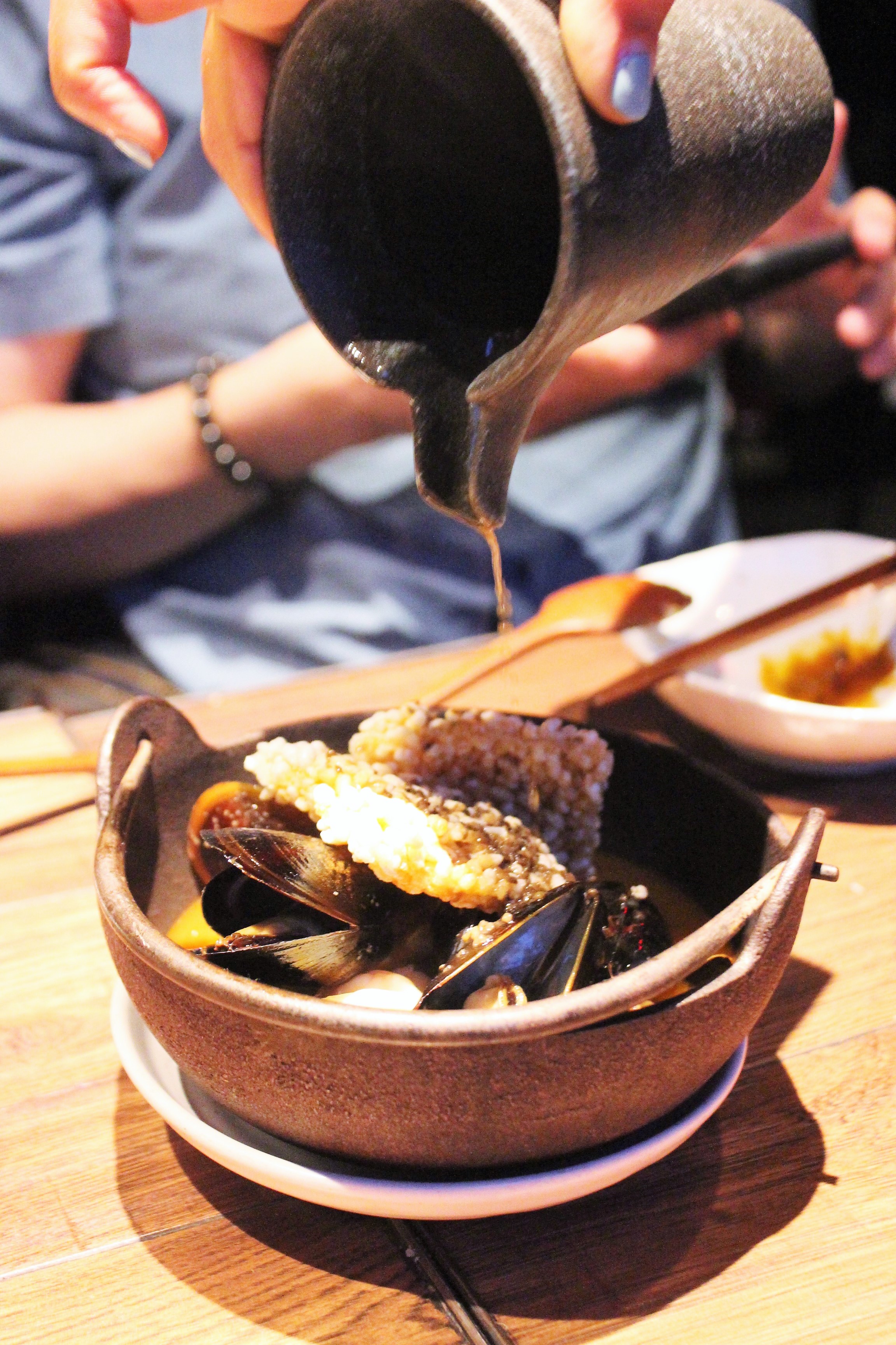 Truffle Seafood Broth with Sizzling Crispy Rice at Oiji in New York City
