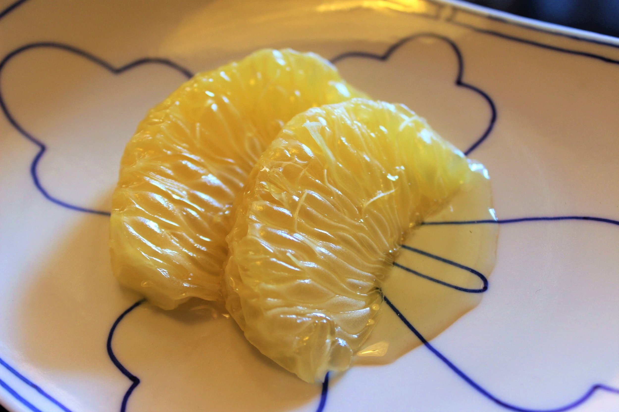 Hassaku Orange Coated with Honey at Tokyo Shiba Tofuya Ukai in Tokyo, Japan