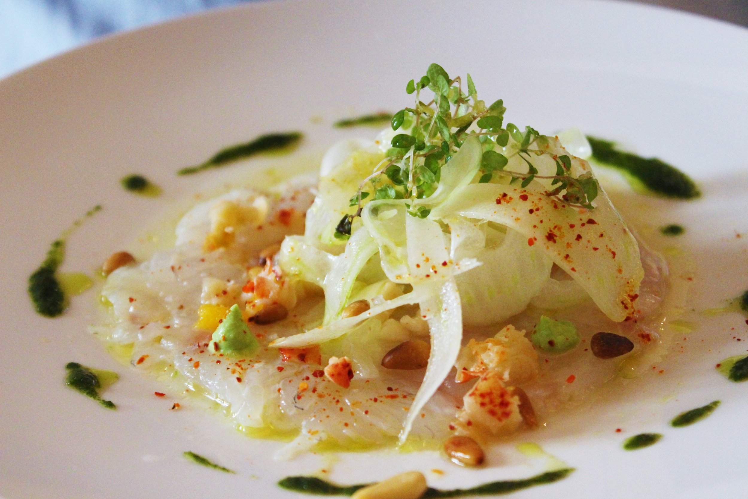 Sea Bream and Langoustine Carpaccio Marinated with Citrus Fruits, Crunchy Fennel with Pine Nuts