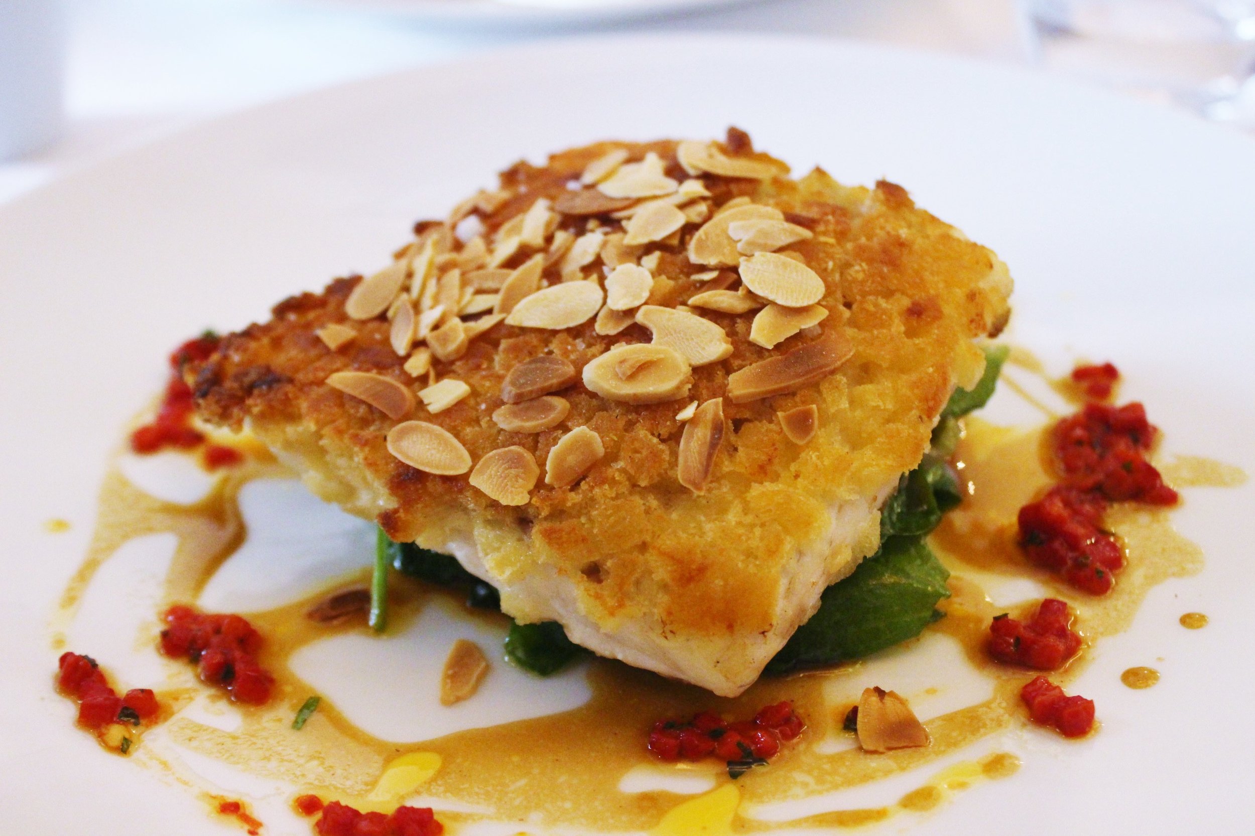 Supreme of Seabass, Crispy Almond Crust with Curried Oil and Peppers