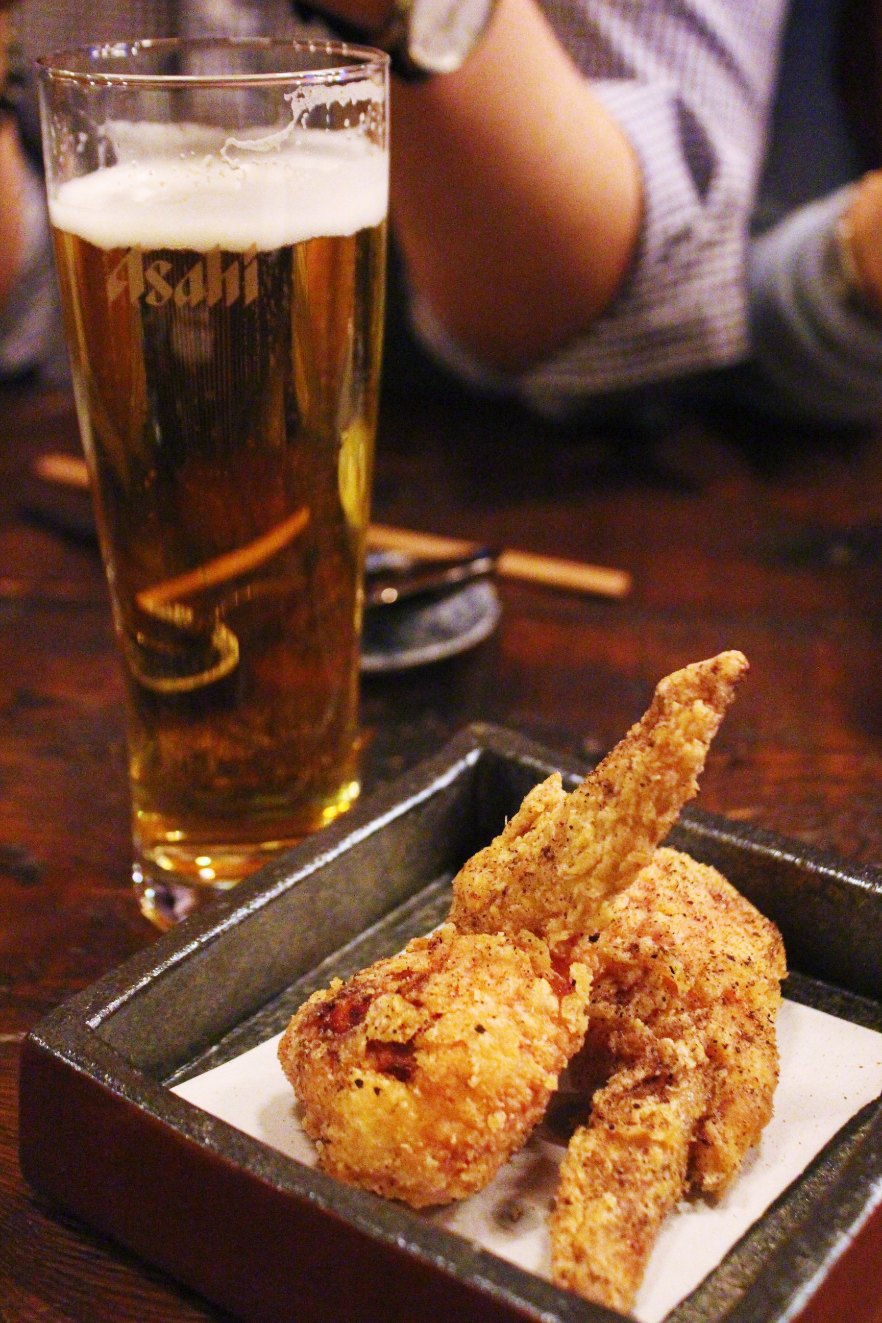 Asahi Draft and Tebasaki Gyoza (Deep Fried Chicken Wings Stuffed with Hudson Valley Foie Gras and Brioche)