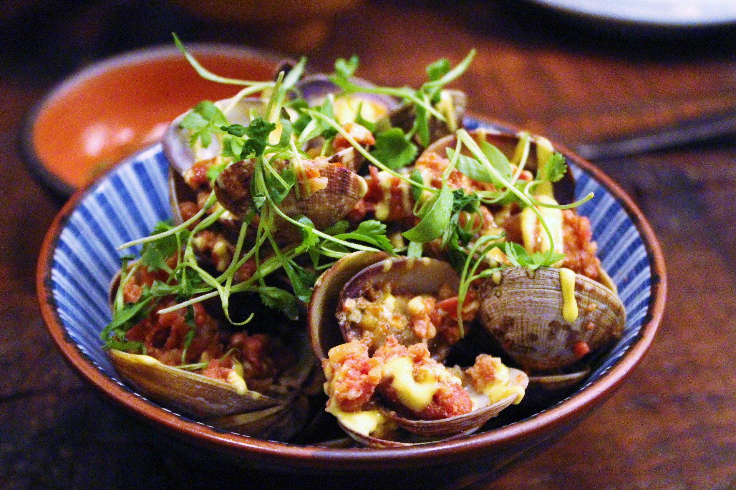 Clams: Chorizo, Garlic, Saffron Aioli, Lemon Zest, Butter with Mu Dipping Sauce at Mu Ramen