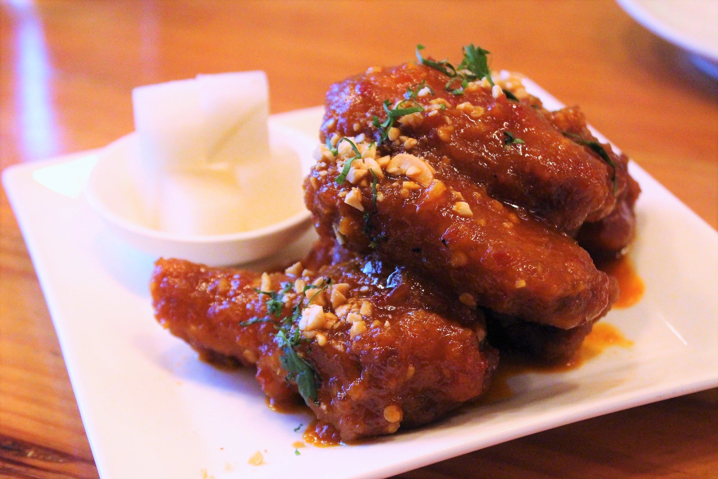 Spicy Korean Fire Chicken Wings with Honey, Garlic, Four Chilies, and Peanuts 