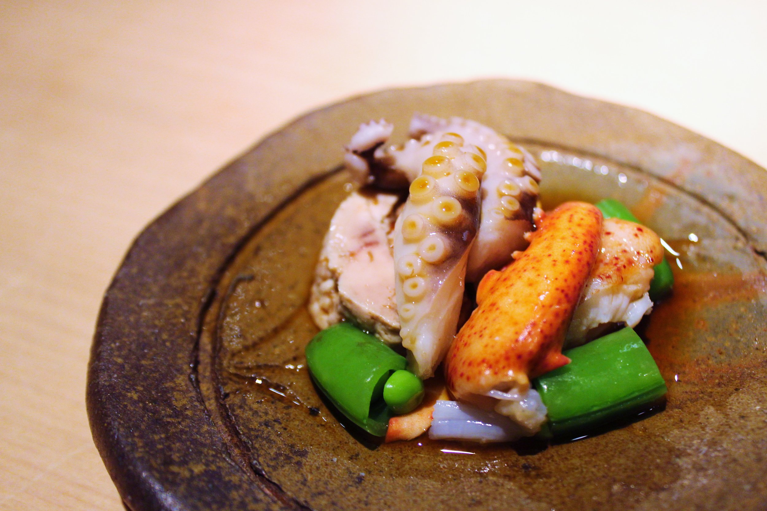 Lightly Poached Maine Lobster, Octopus from Portugal, Steamed Monk Fish Liver, Sugar Snap Peas with Citrus Soy Sauce