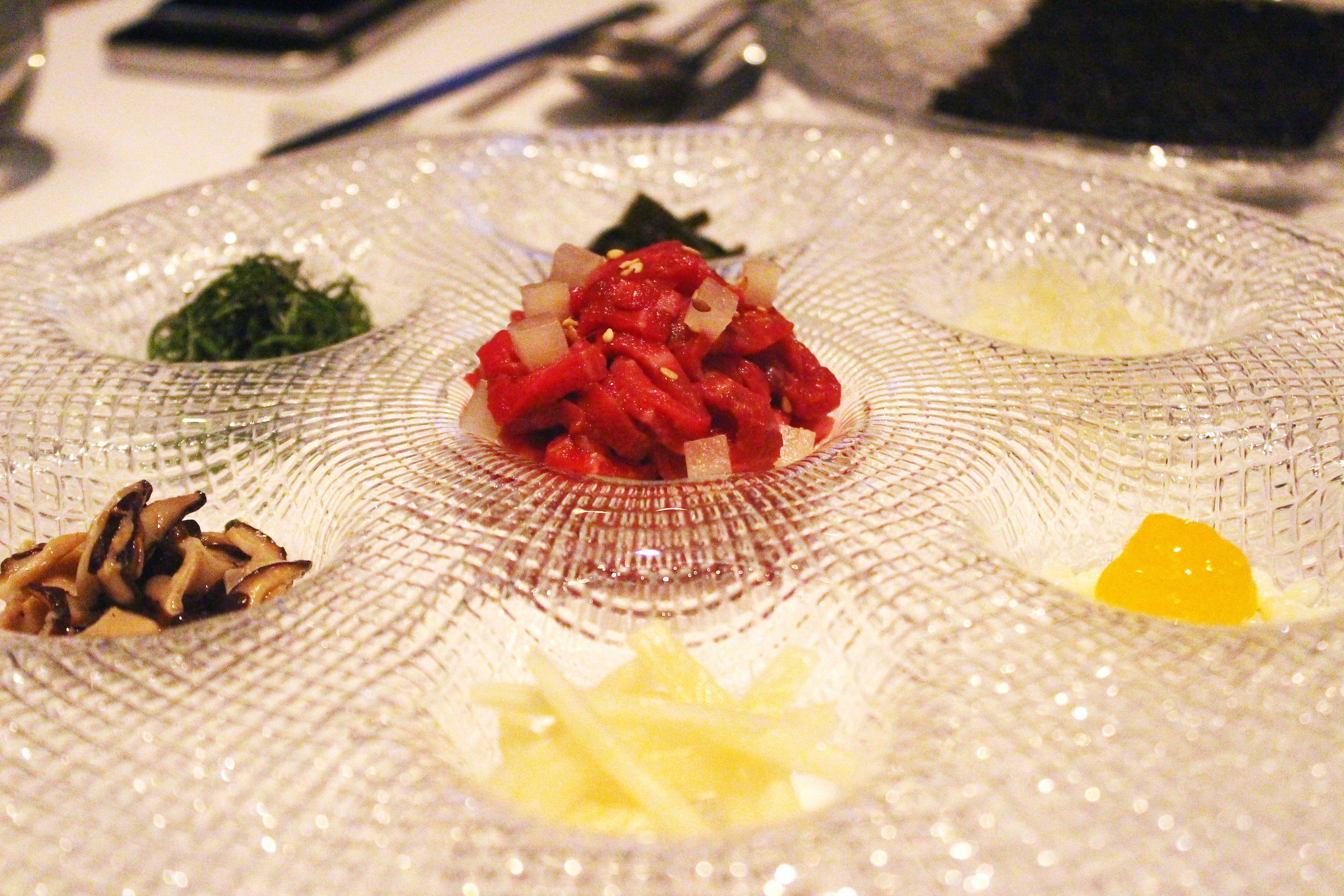 Gu Jeol Pan: Beef Tartare with Crispy Seaweed and toppings