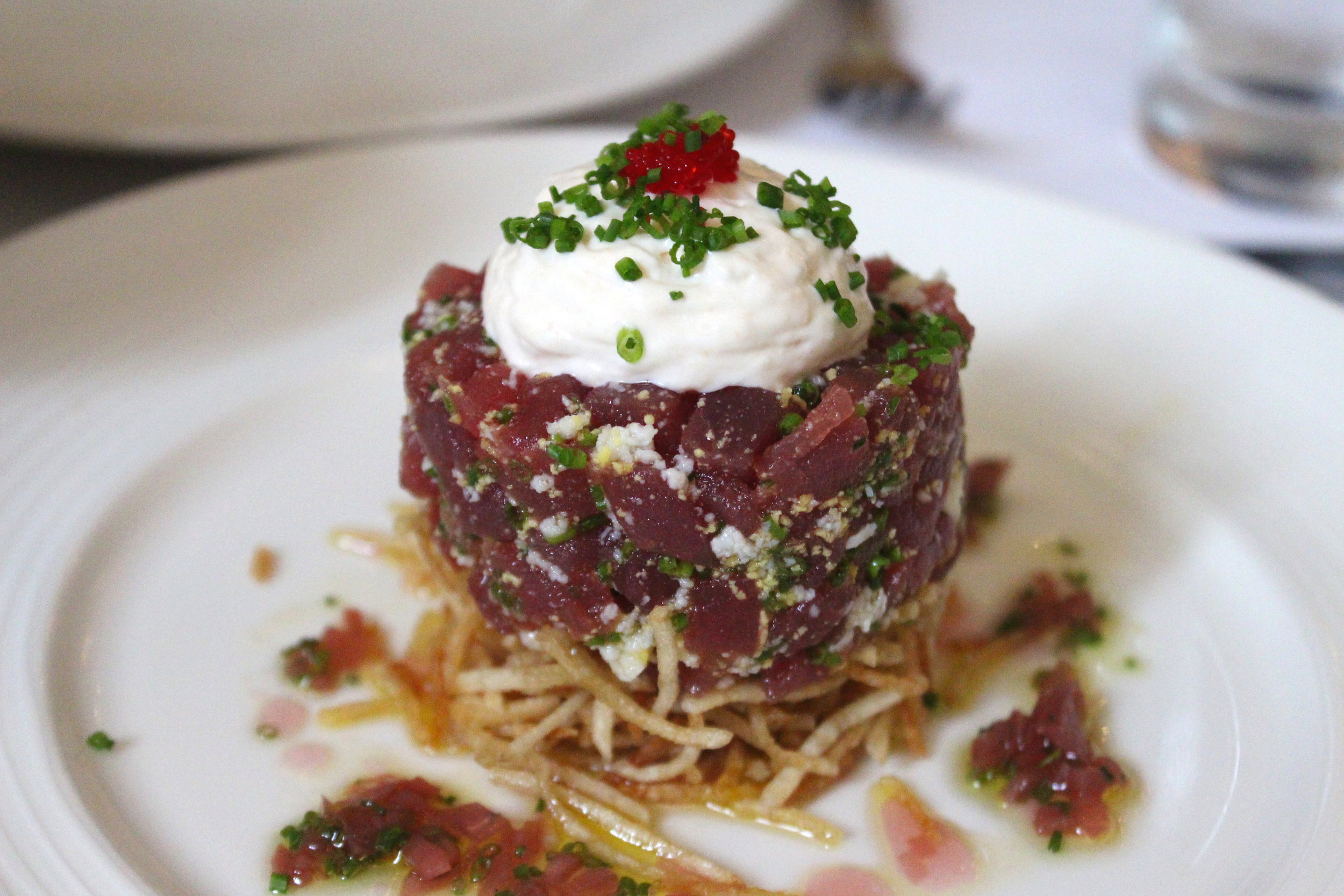 Tuna Tartare, potato kataifi, tarama espuma, and pickled shallot vinaigrette