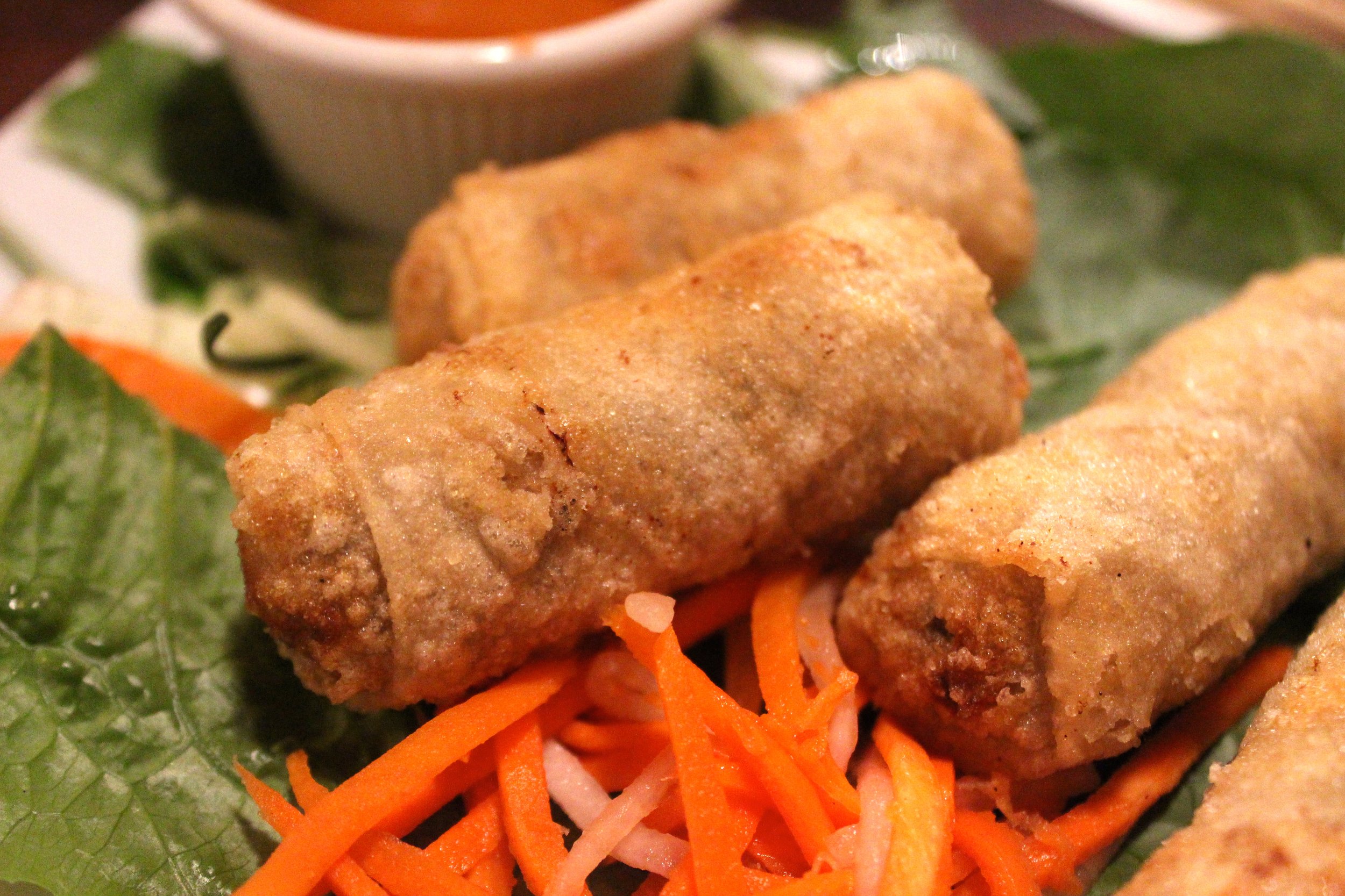 Fried Spring Rolls: Minced Pork, Shrimp, and Glass Noodles wrapped in Rice Paper 
