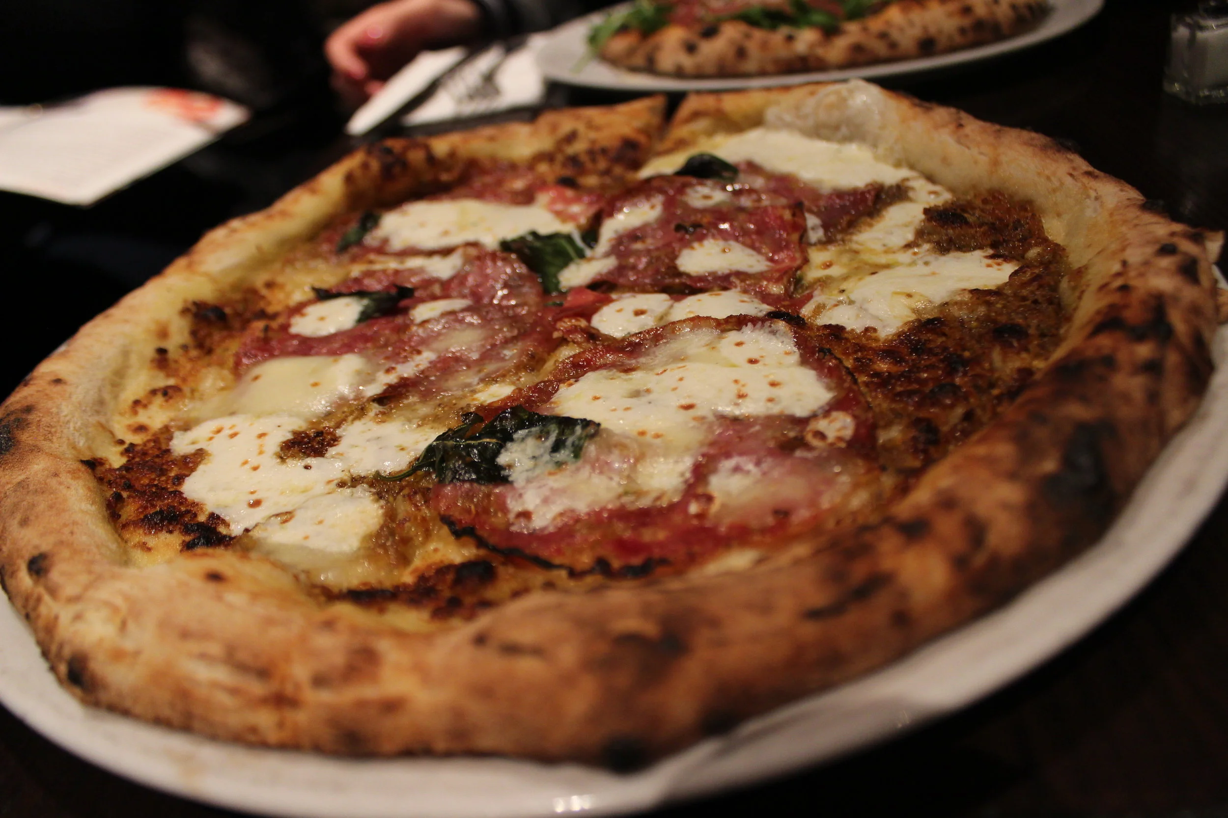 Pistacchio e Salsiccia: Fresh Pistacchio Pesto, Sausage, Homemade Mozzarella, Pecorino Romano, Basil, EV Olive Oil at Keste