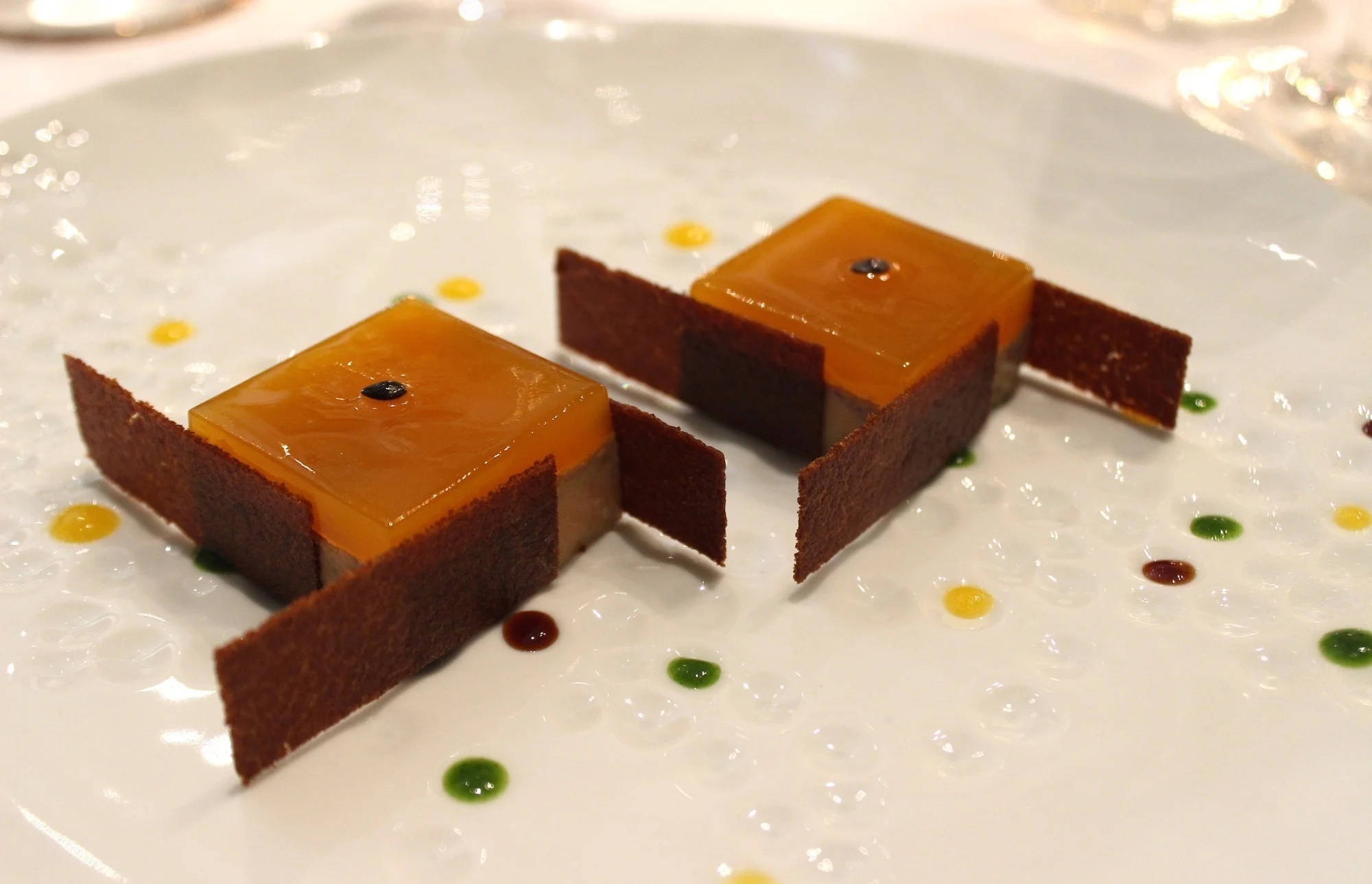Spicy Foie Gras with Passion Fruit Jelly brewed with Coffee at Le Cinq