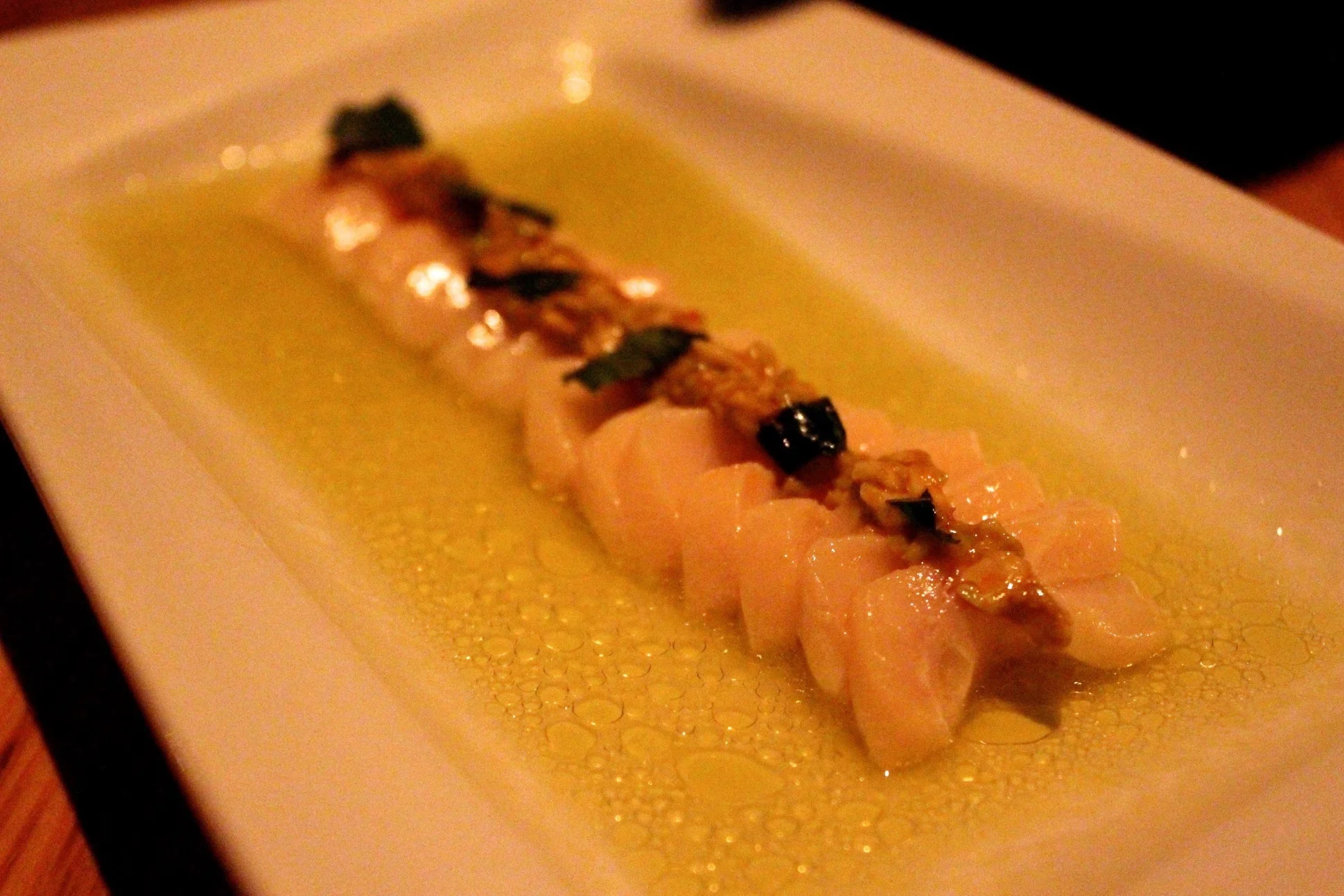 Escolar with avocado, basil, chilies at L'Artusi