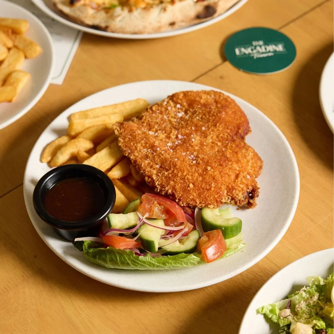Our crowd pleaser - Chicken schnitzel - Golden, crispy, and everyone&rsquo;s favourite 😋 #ChickenSchnitzelLove&rdquo; @theengadinetavern