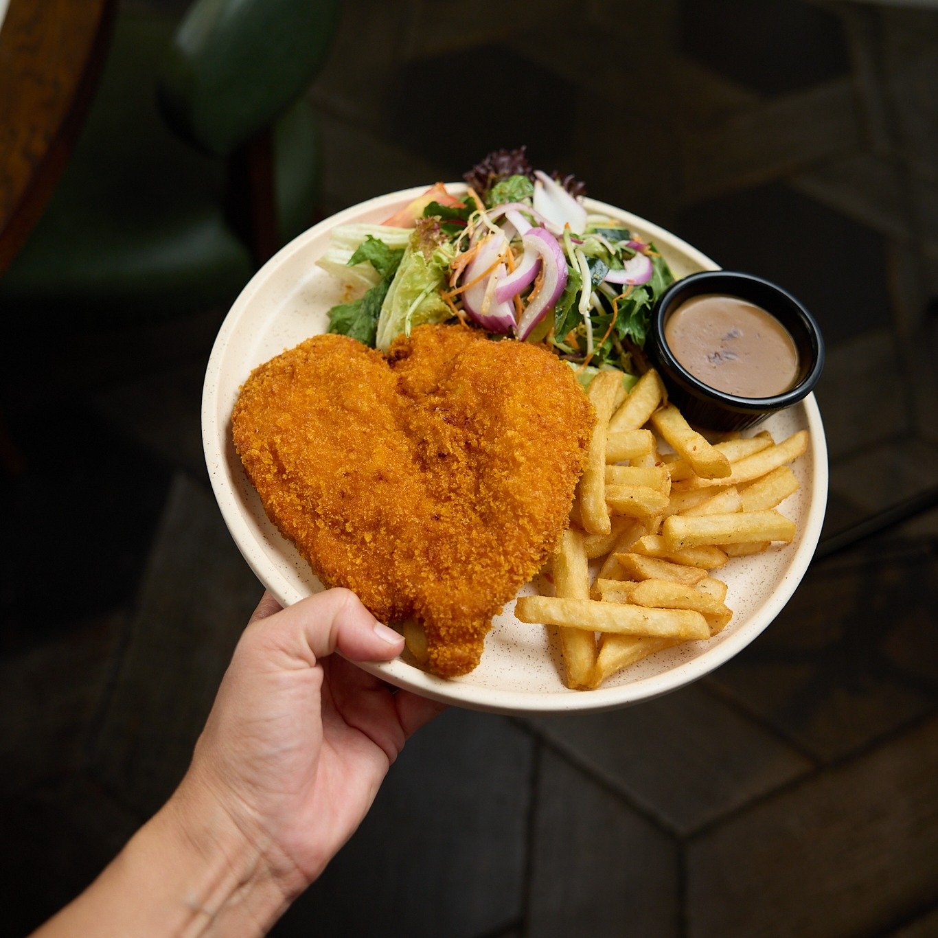 Schnitzel lovers, this one&rsquo;s for you! 💛
Golden, juicy, and cooked to perfection &mdash; just the way you like it.

👉 Tag your fav venue for the best schnitzel 👇