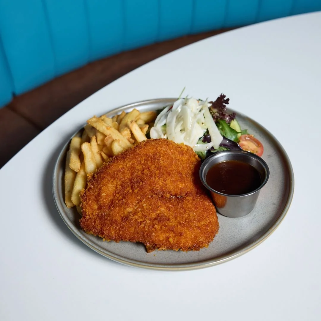 Our signature schnitzel &mdash; golden, crispy, and crafted to deliver every time.