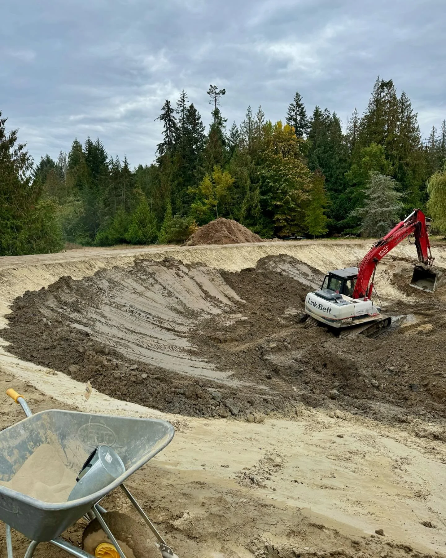 Another #pond project entering its home stretch. The walls are being covered here with a layer of silty clay after receiving a layer of powdered bentonite for an improved seal. 
This pond is being constructed with varying depths for improved habitat,