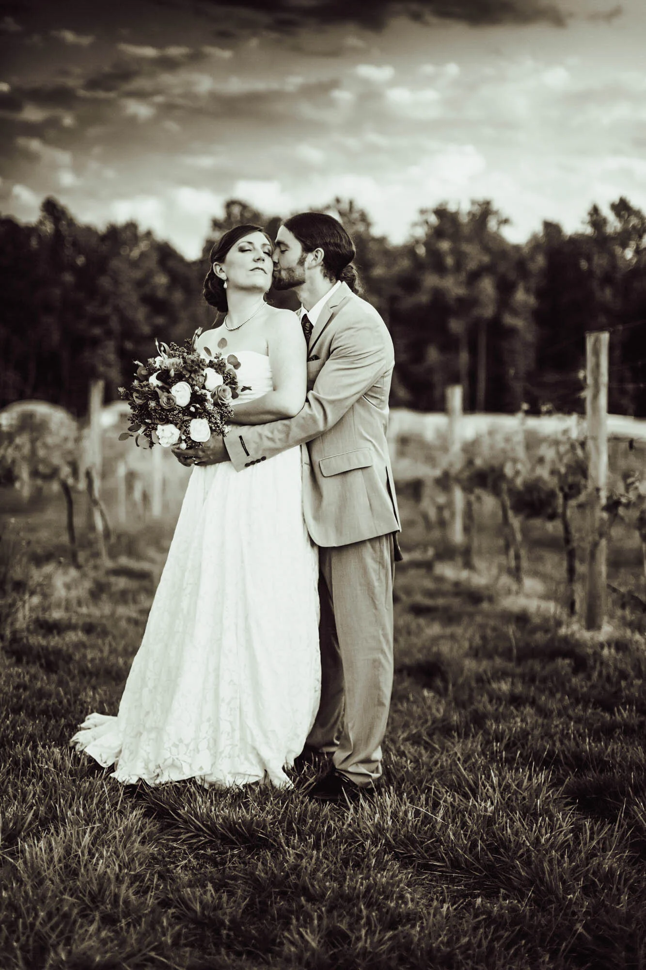 bride and groom in vineyard.jpg
