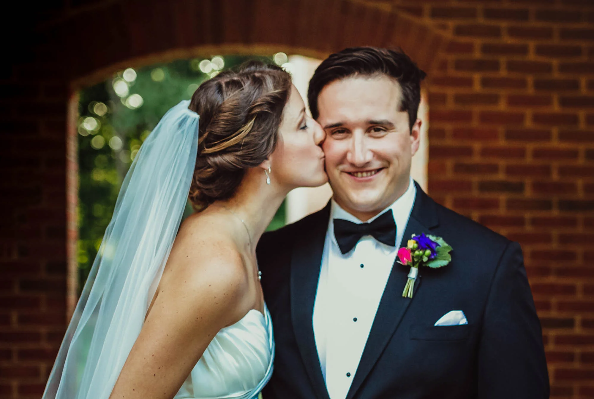 bride kissing groom.jpg