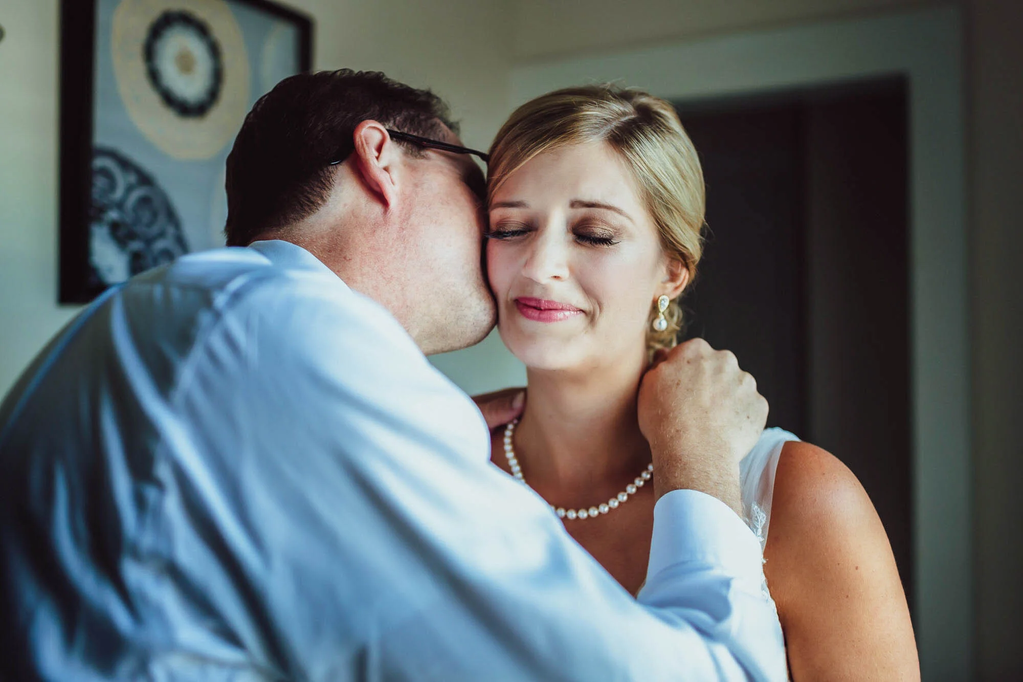 father kissing brides cheek.jpg