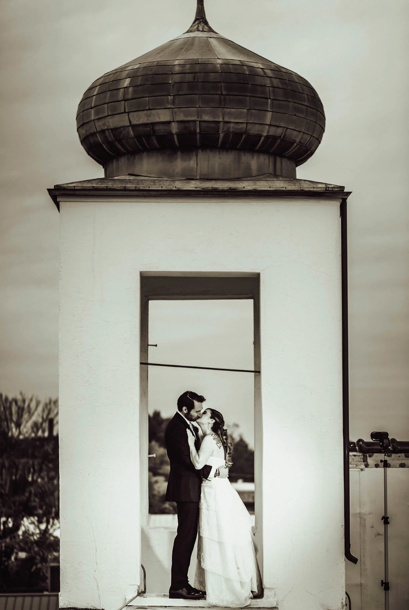 groom and bride on roof.jpg