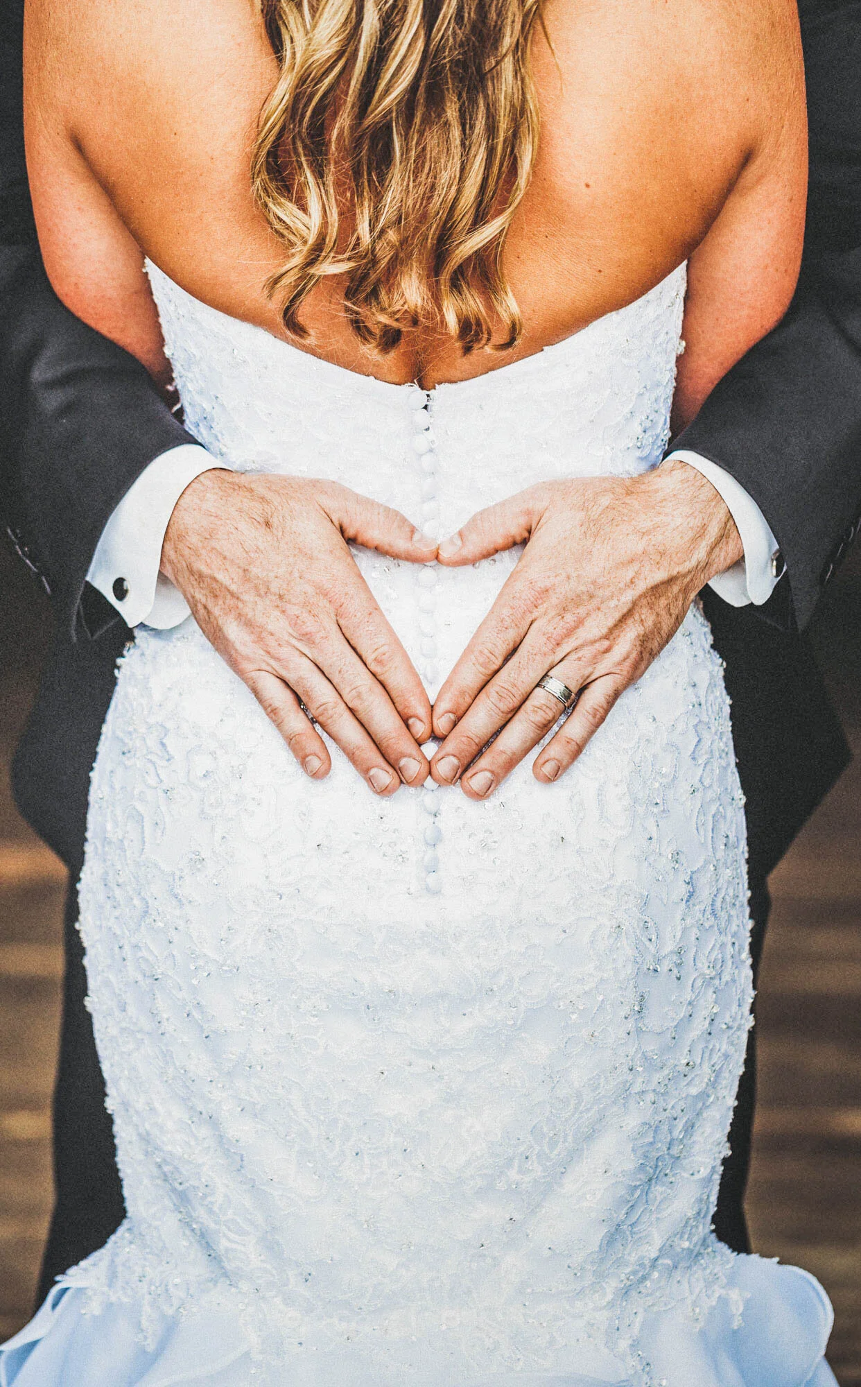 groom hugging bride.jpg