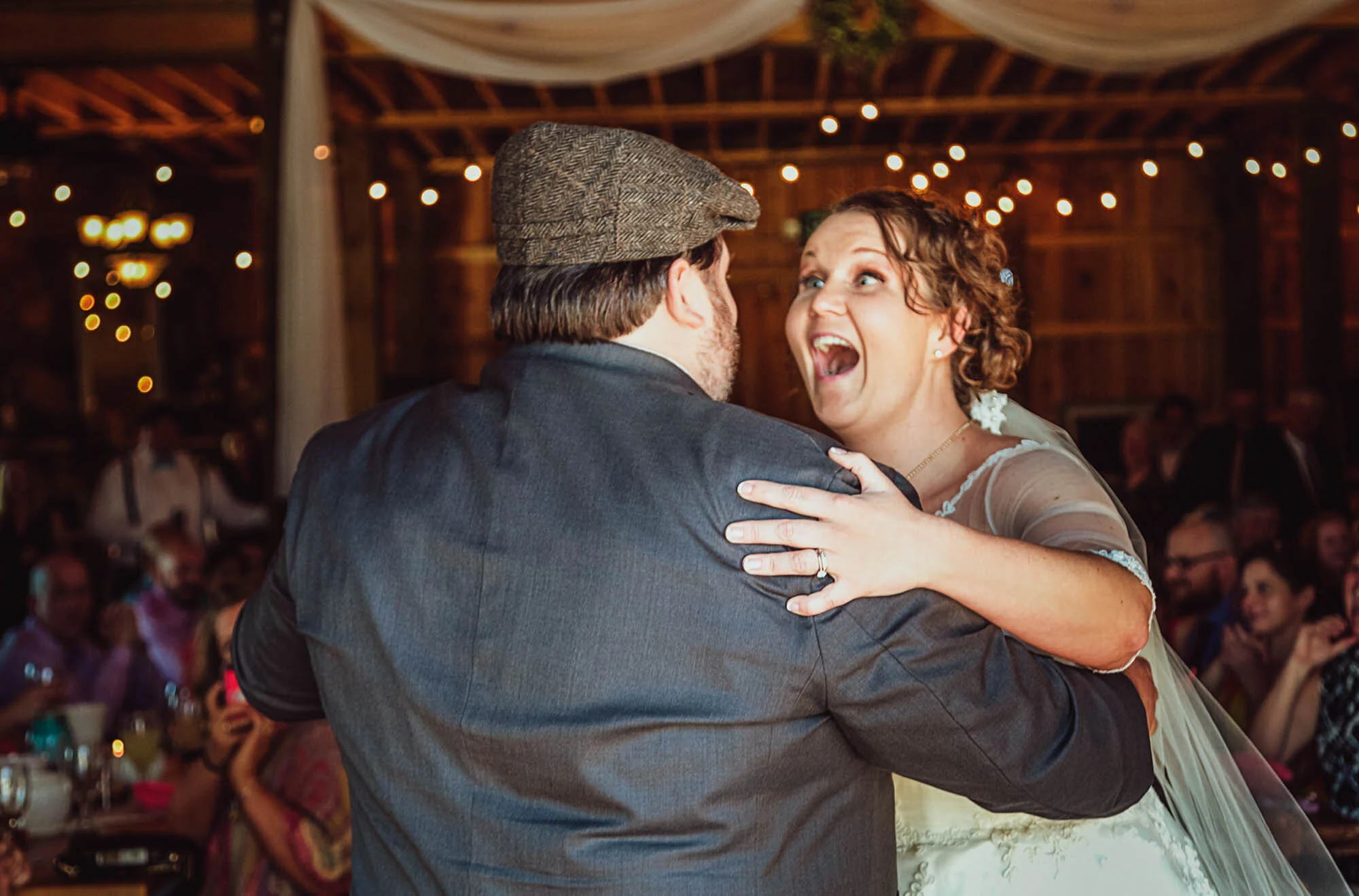 laughing bride and groom dancing.jpg