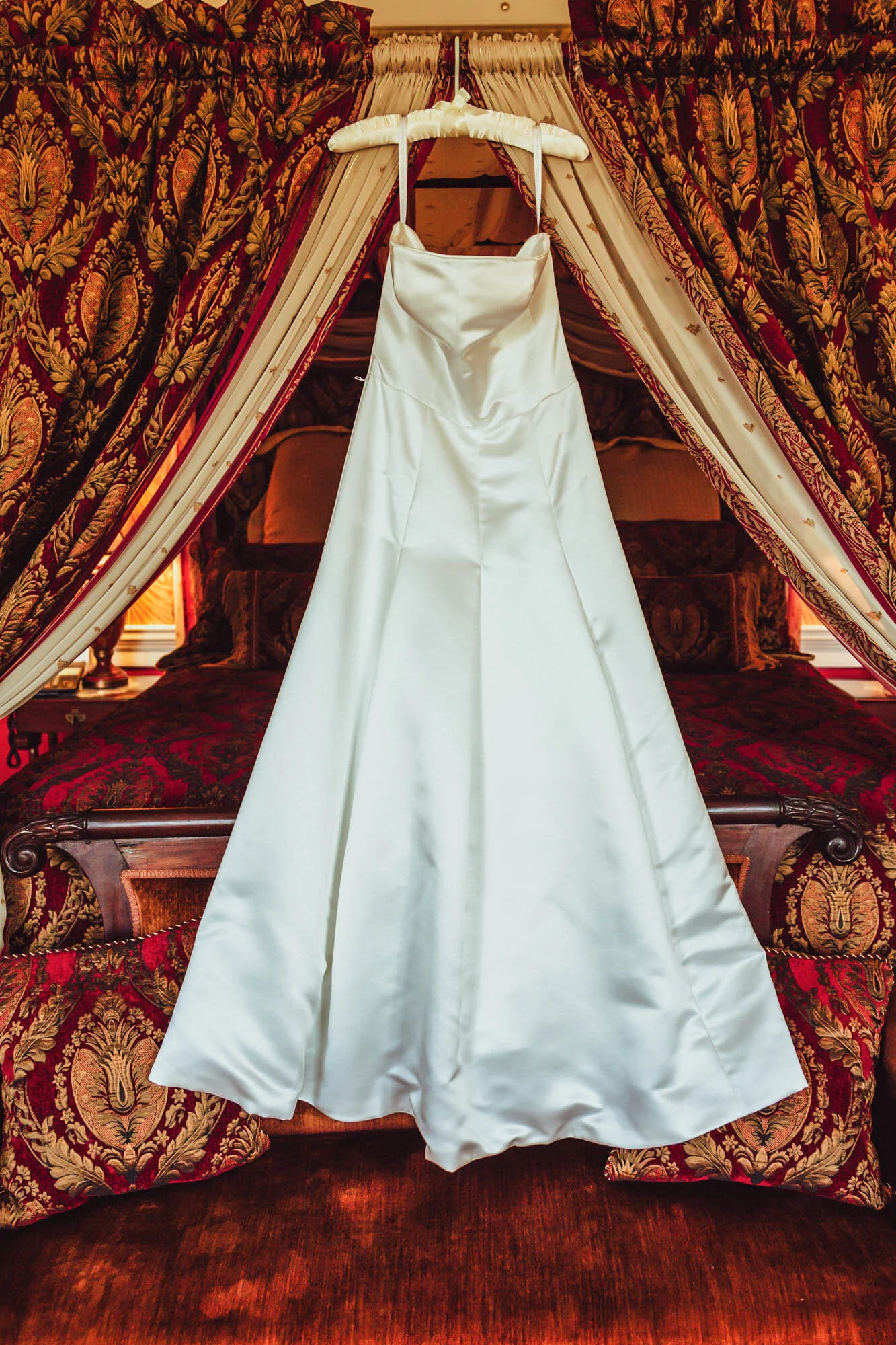 wedding dress on bed.jpg