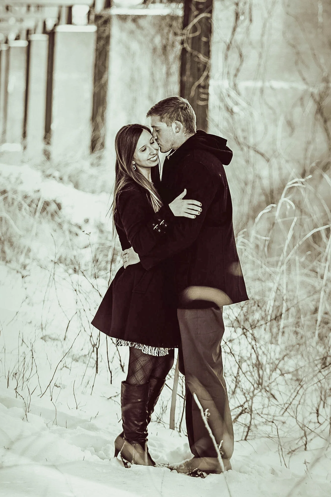 couple embracing in the snow.jpg