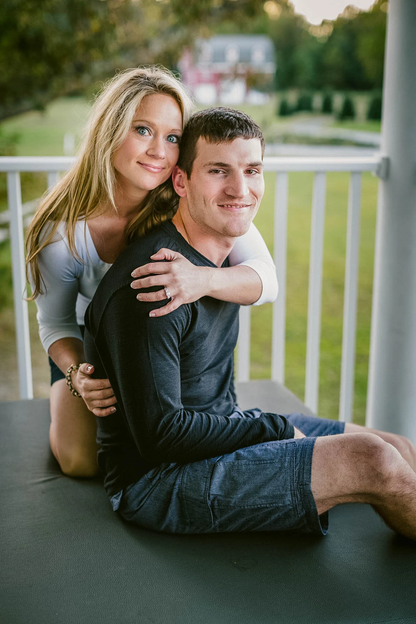 couple huggin on porch.jpg