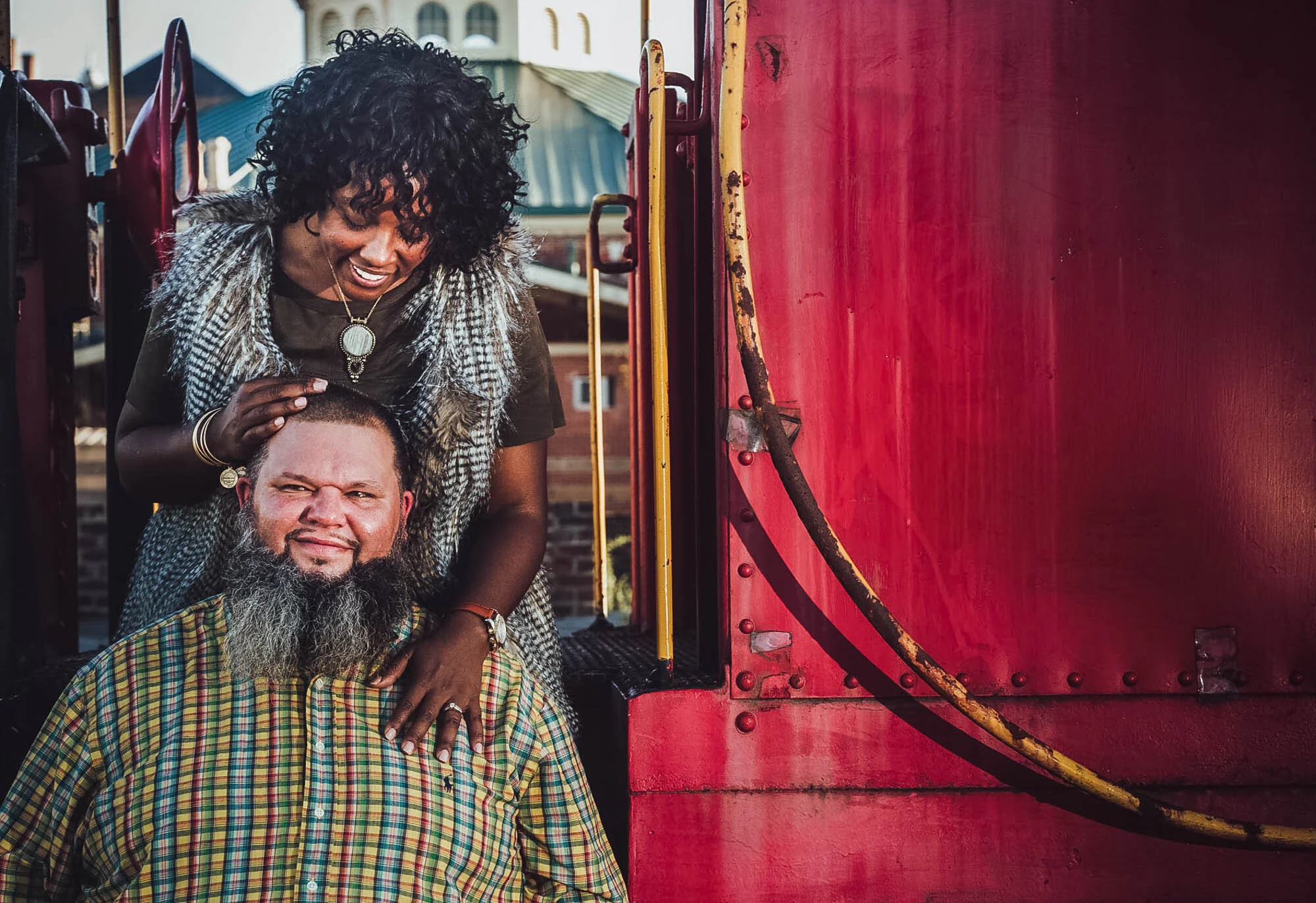 couple hugging on a train car.jpg