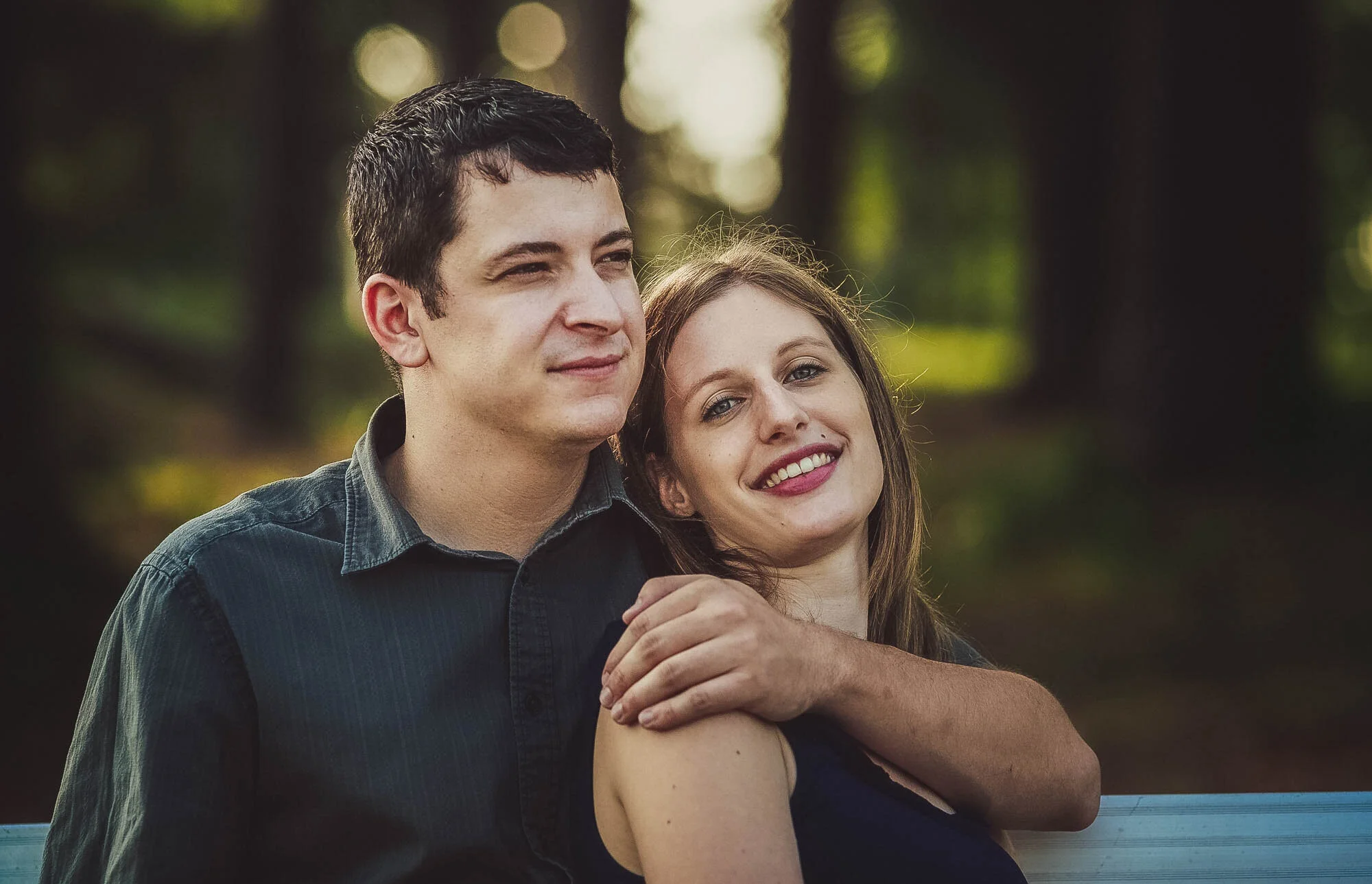 couple hugging on bench.jpg
