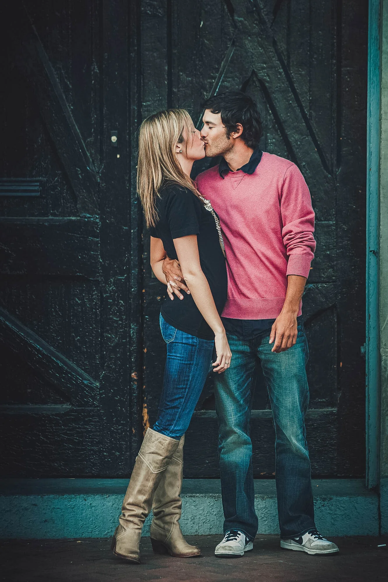 couple kissing in doorway.jpg