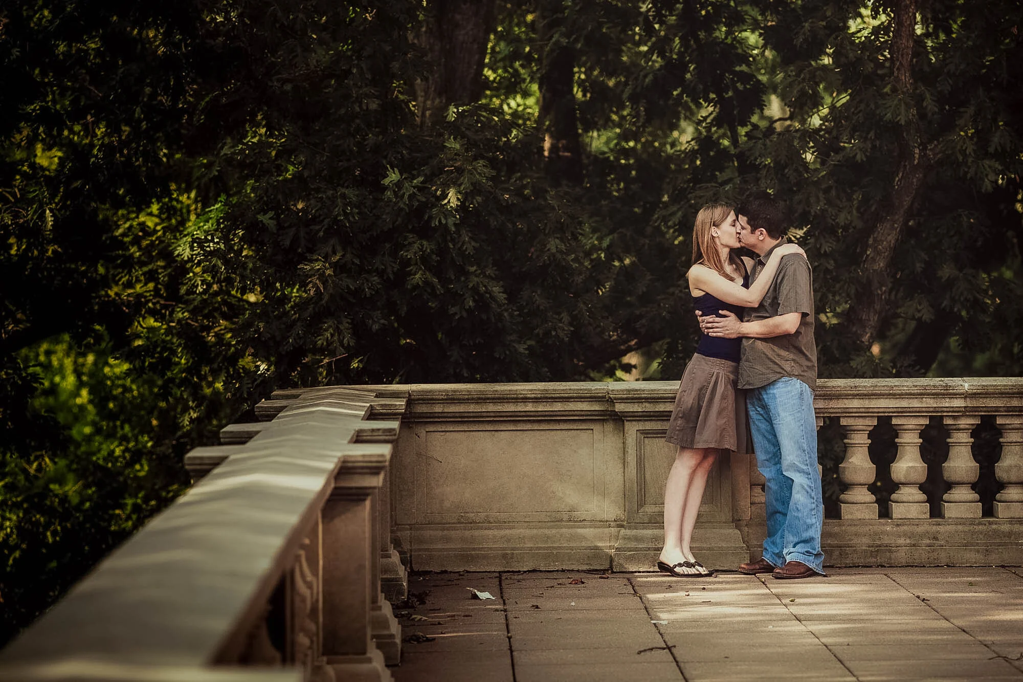 couple kissing on patio.jpg